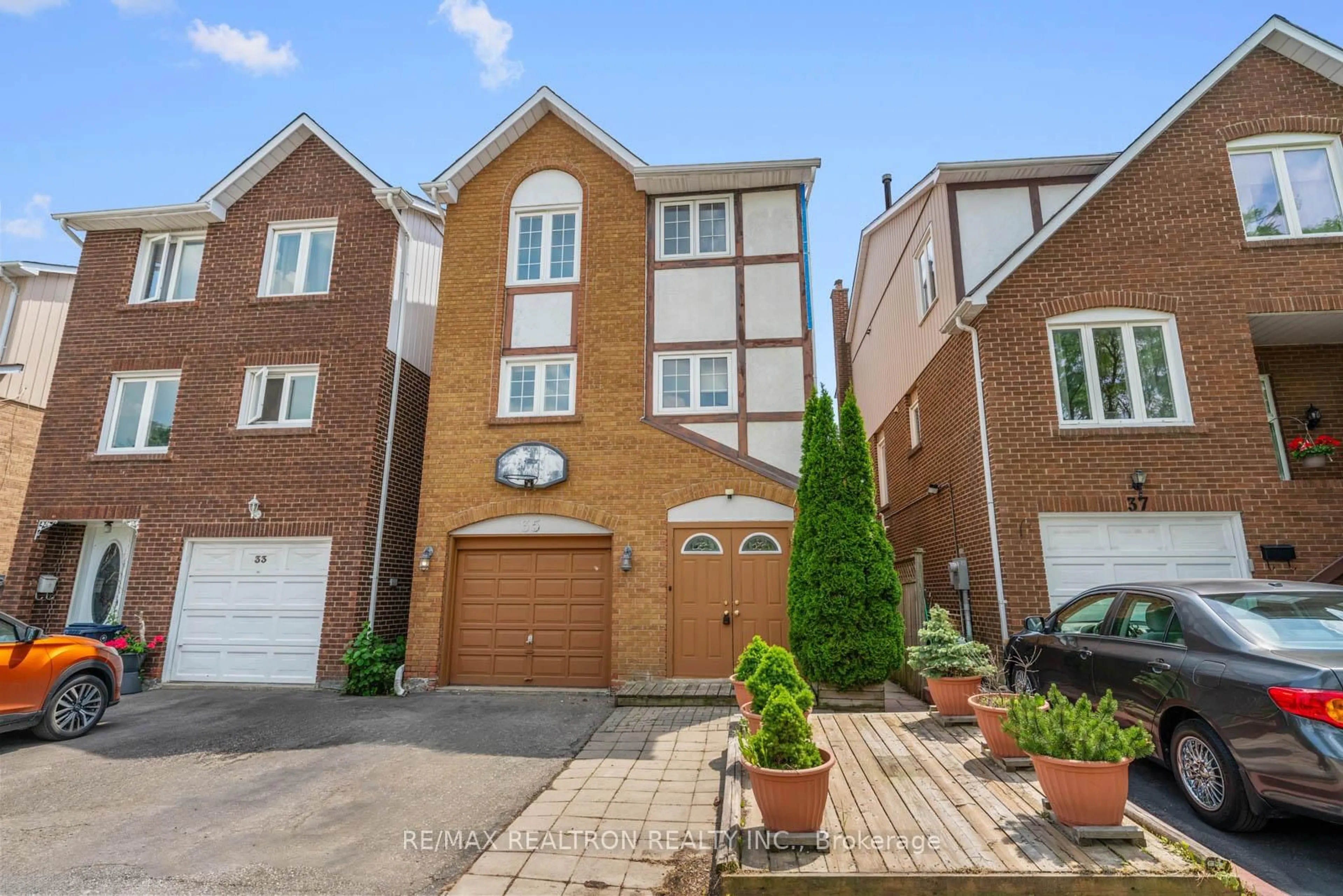 Home with brick exterior material, street for 35 Festival Dr, Toronto Ontario M2R 3T9