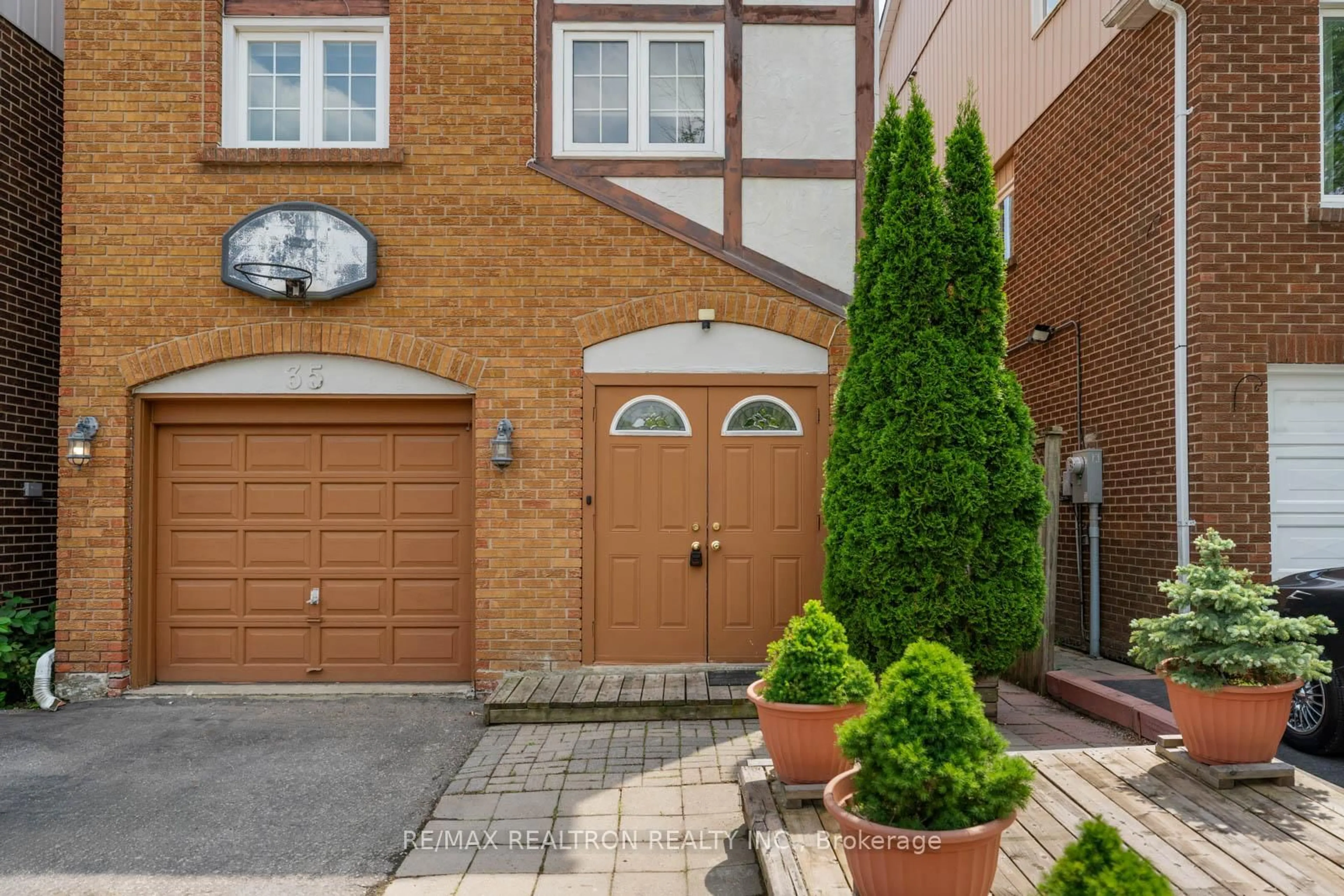 Home with brick exterior material, street for 35 Festival Dr, Toronto Ontario M2R 3T9