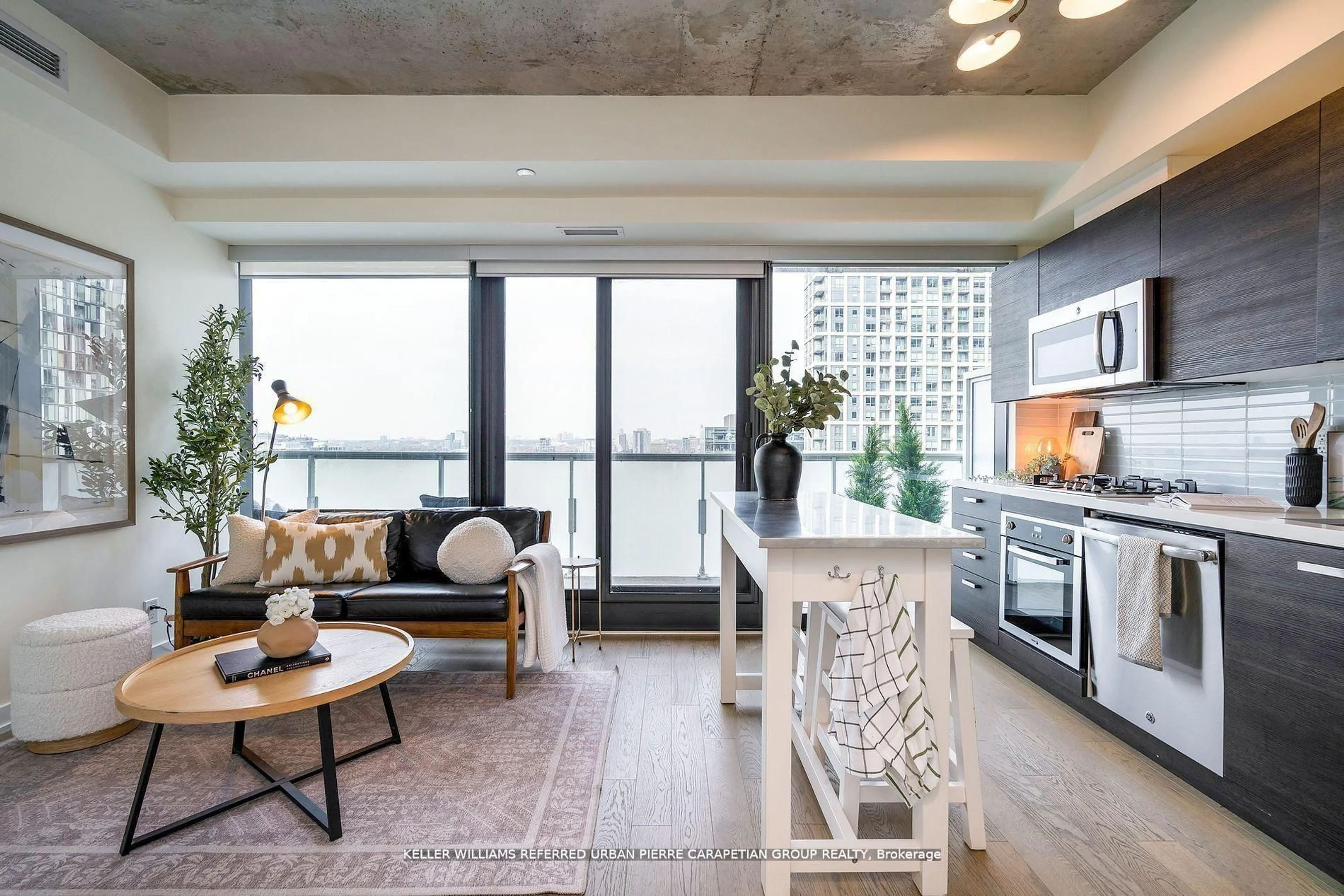 Open concept kitchen, cement floor for 11 Charlotte St #2004, Toronto Ontario M5V 0M6