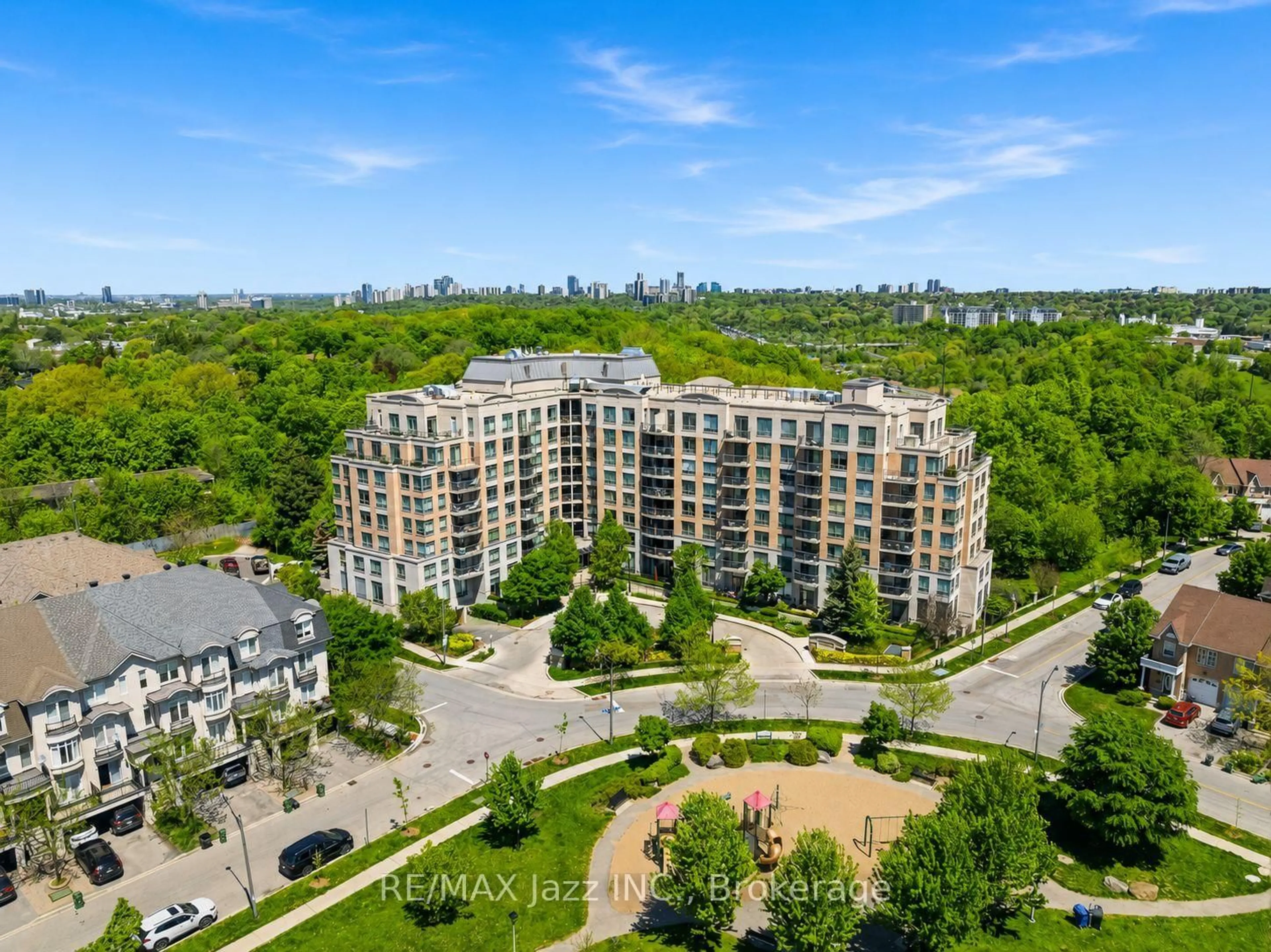 A pic from outside/outdoor area/front of a property/back of a property/a pic from drone, city buildings view from balcony for 16 Dallimore Circ #307, Toronto Ontario M3C 4C4