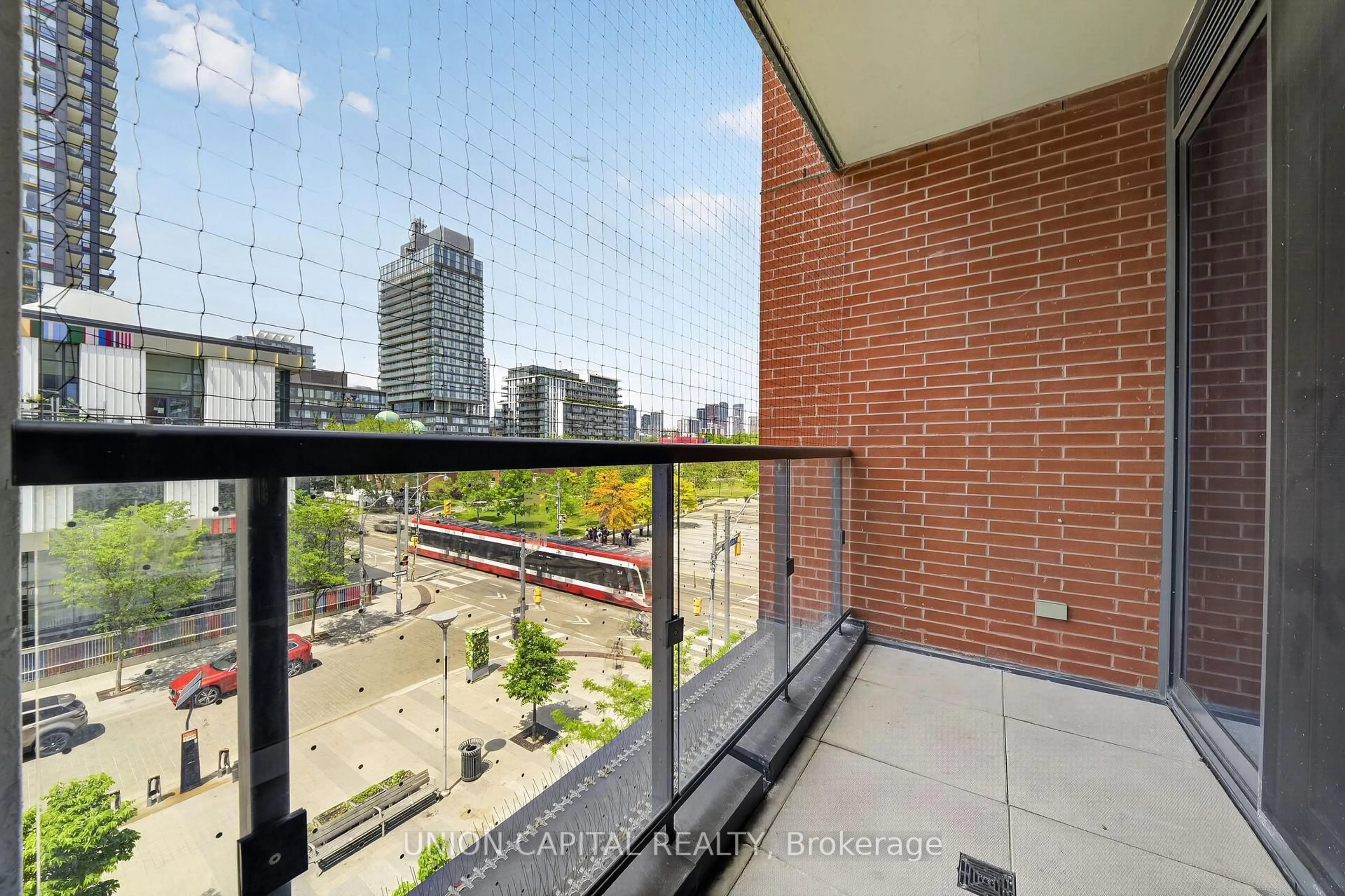 Balcony in the apartment, city buildings view from balcony for 170 Sumach St #417, Toronto Ontario M5A 0C3