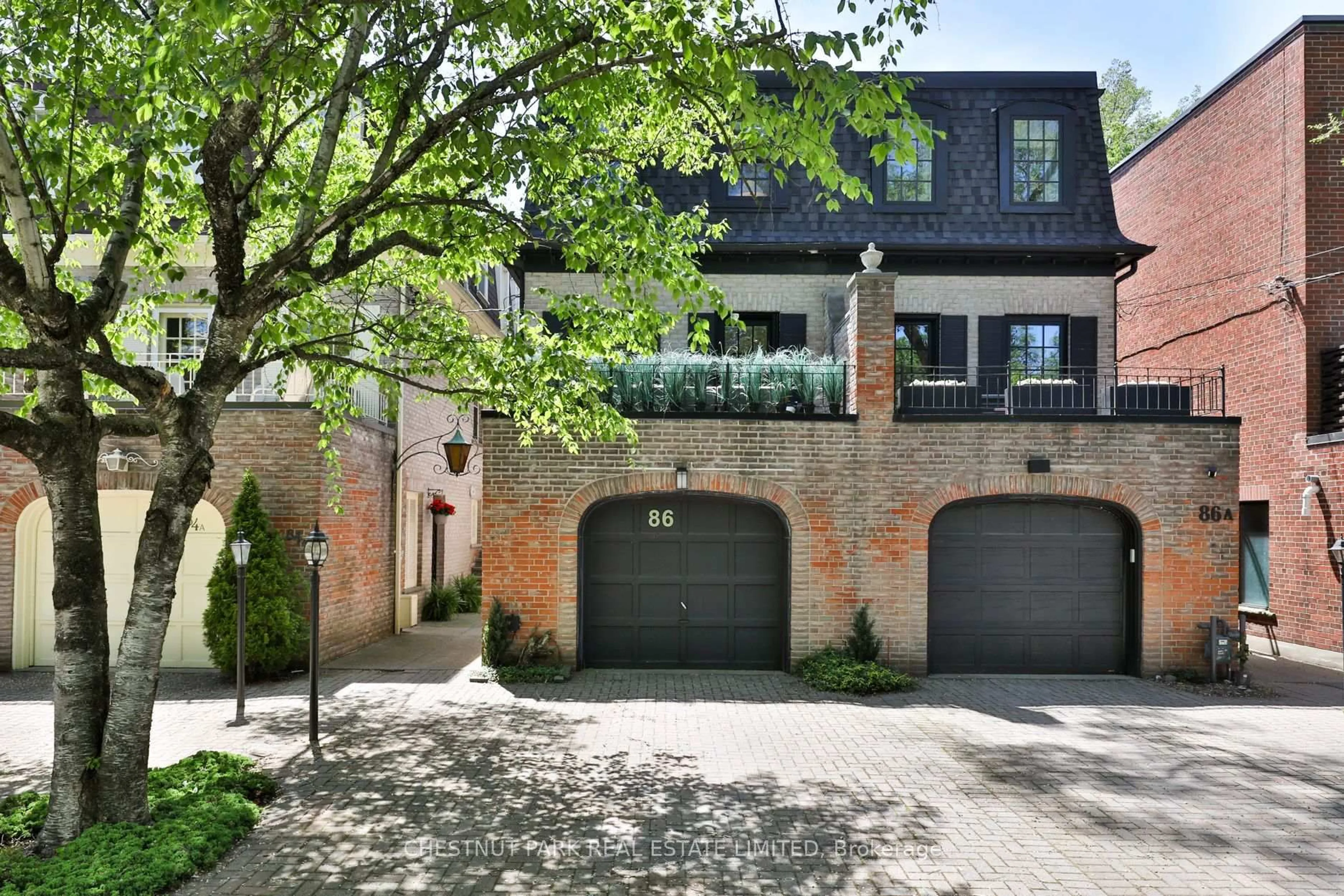 Home with brick exterior material, street for 86 Glen Rd, Toronto Ontario M4W 2V6
