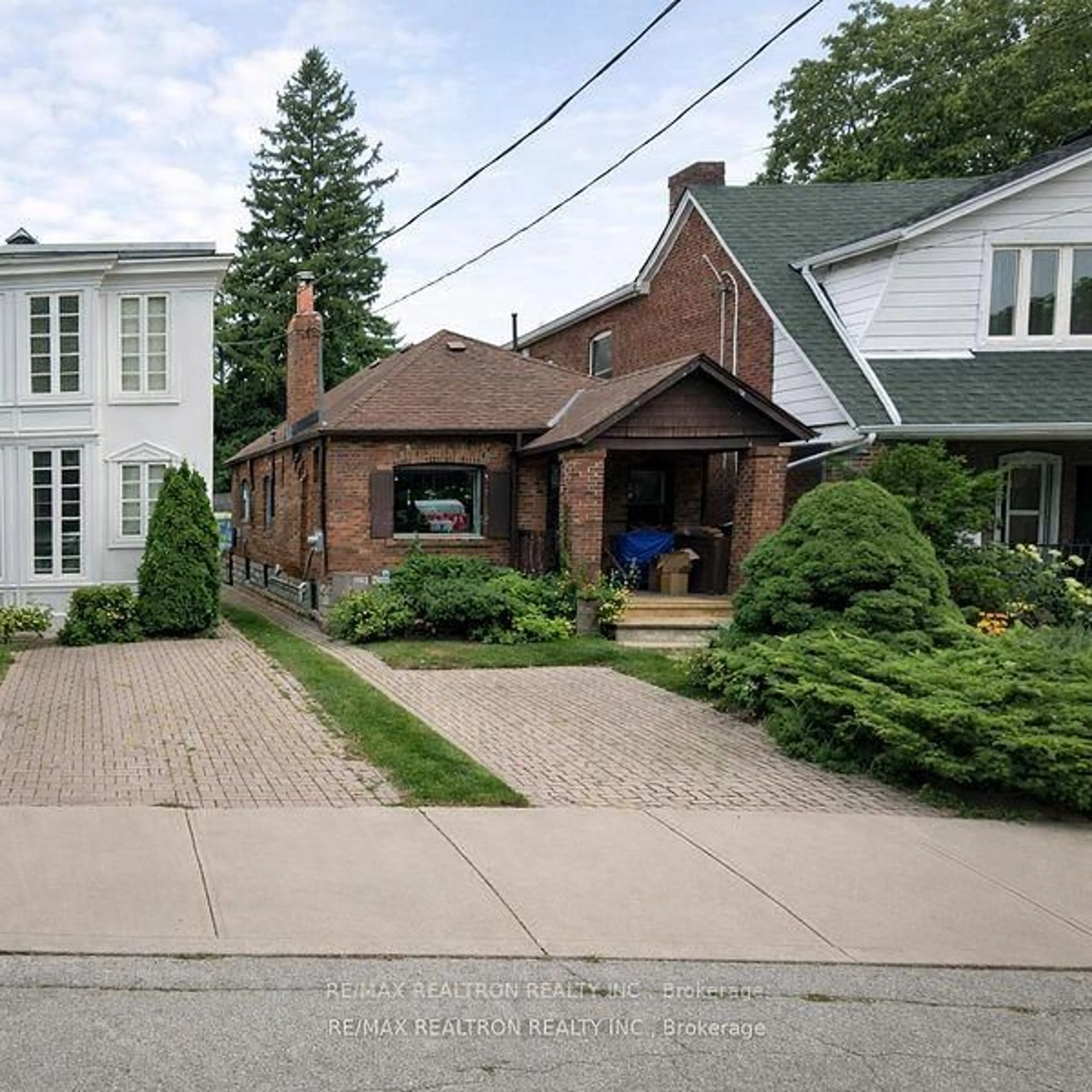 Home with brick exterior material, street for 52 Belcourt Rd, Toronto Ontario M4S 2T9