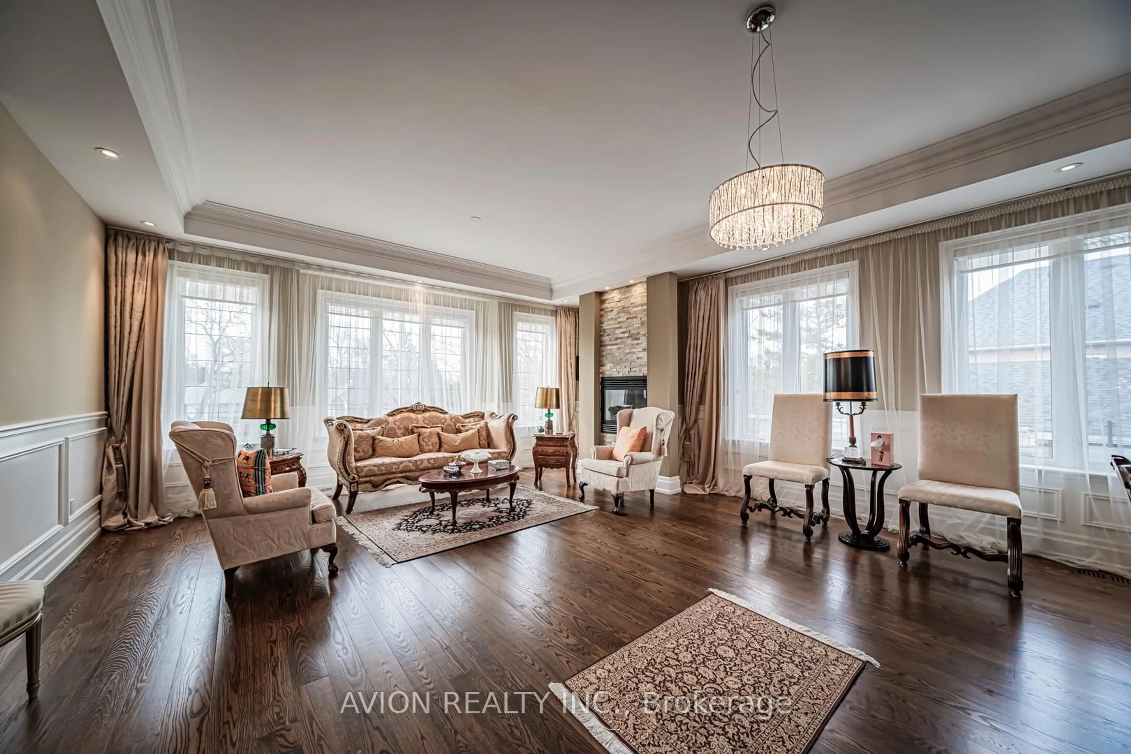 Living room with furniture, wood/laminate floor for 136 Homewood Ave, Toronto Ontario M2M 1K3
