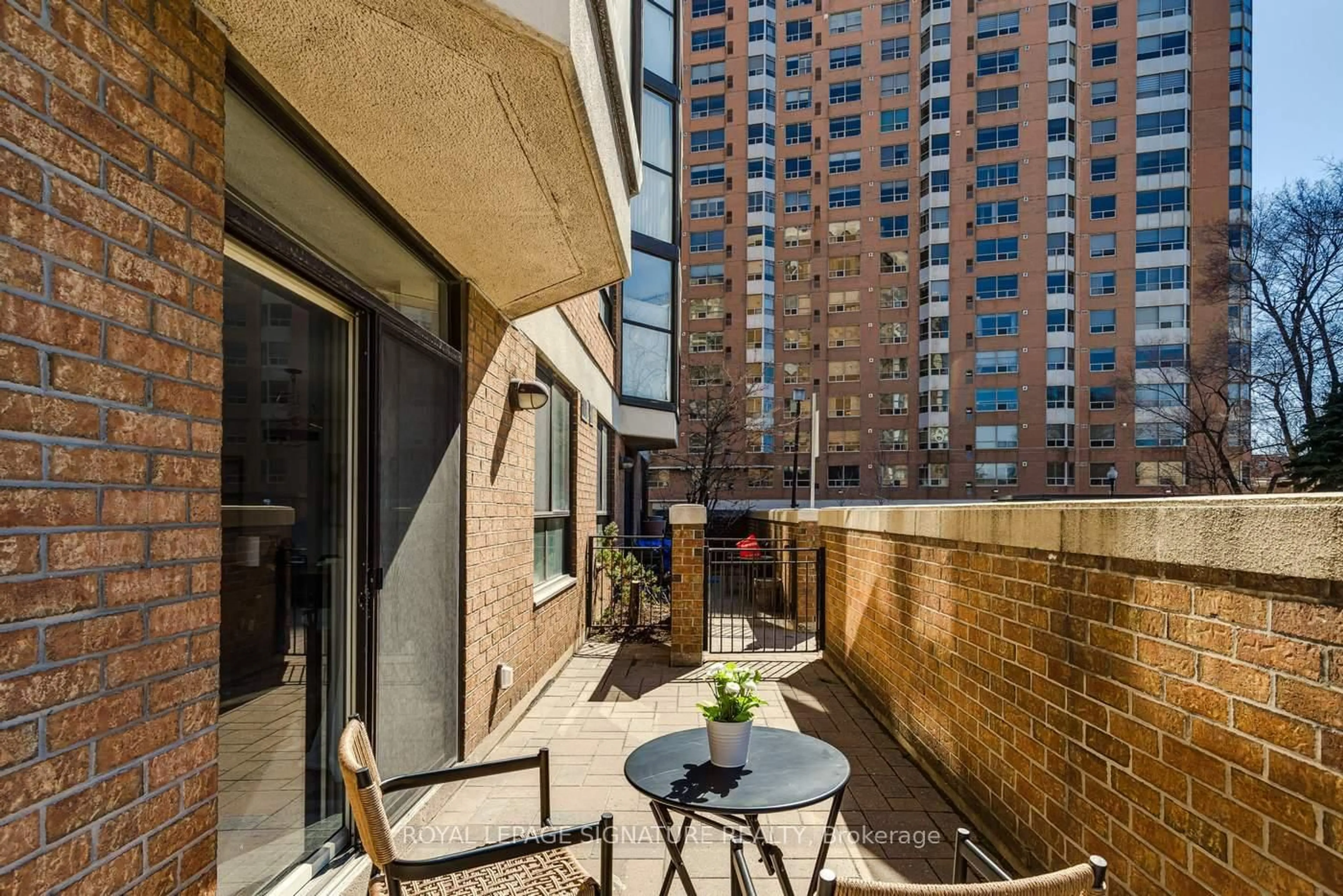 Patio, city buildings view from balcony for 271 Ridley Blvd #108, Toronto Ontario M5M 4N6