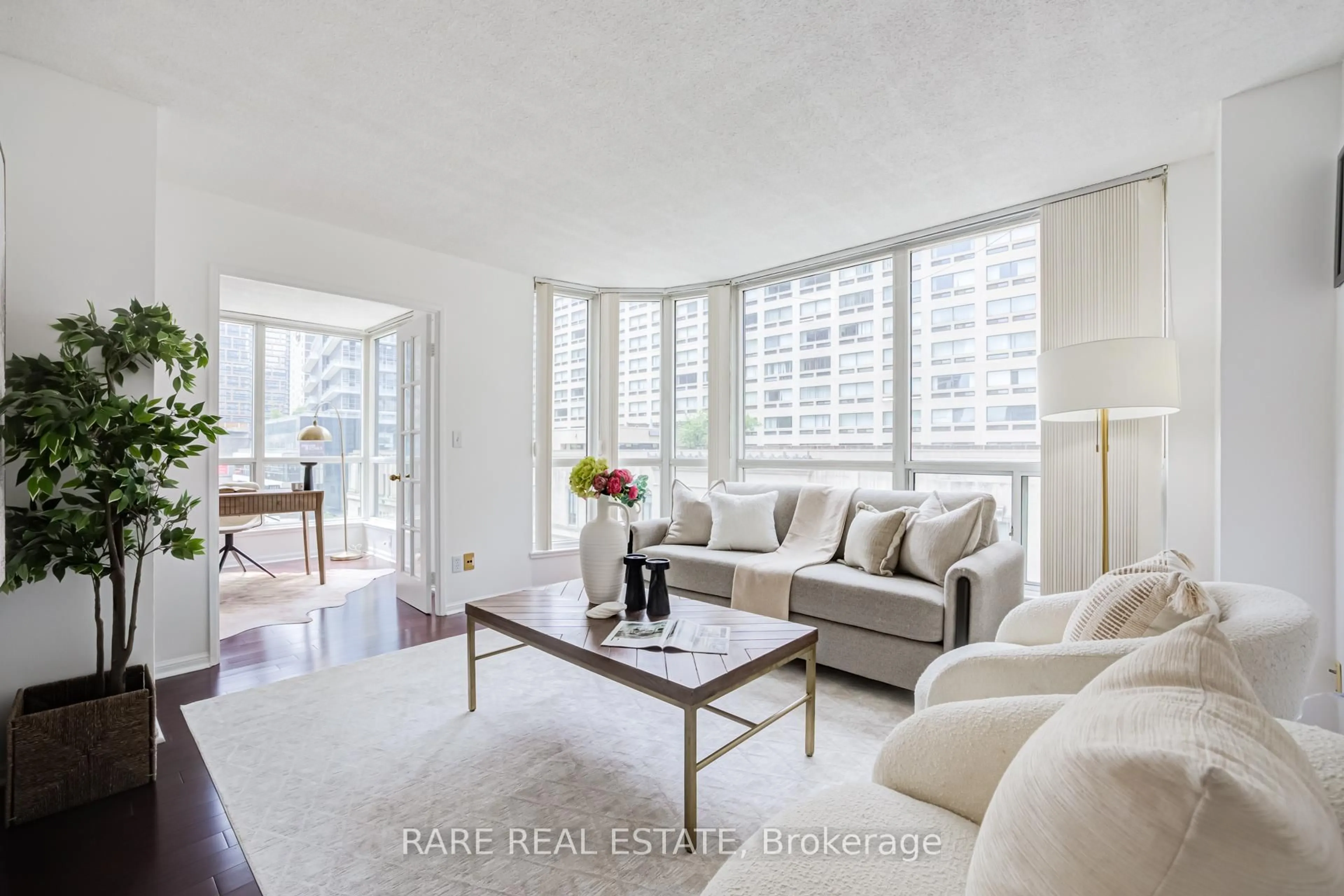 Living room with furniture, unknown for 7 Carlton St #506, Toronto Ontario M5B 2M3
