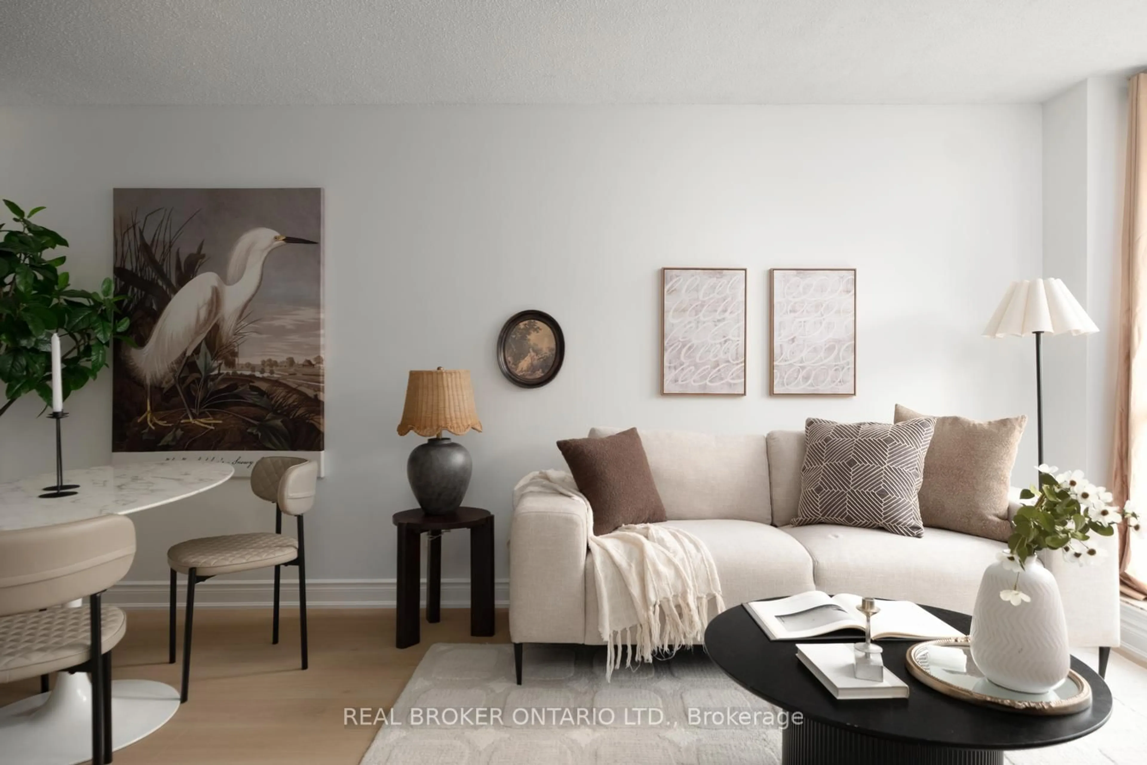 Living room with furniture, wood/laminate floor for 1000 King St #304, Toronto Ontario M6K 3N1