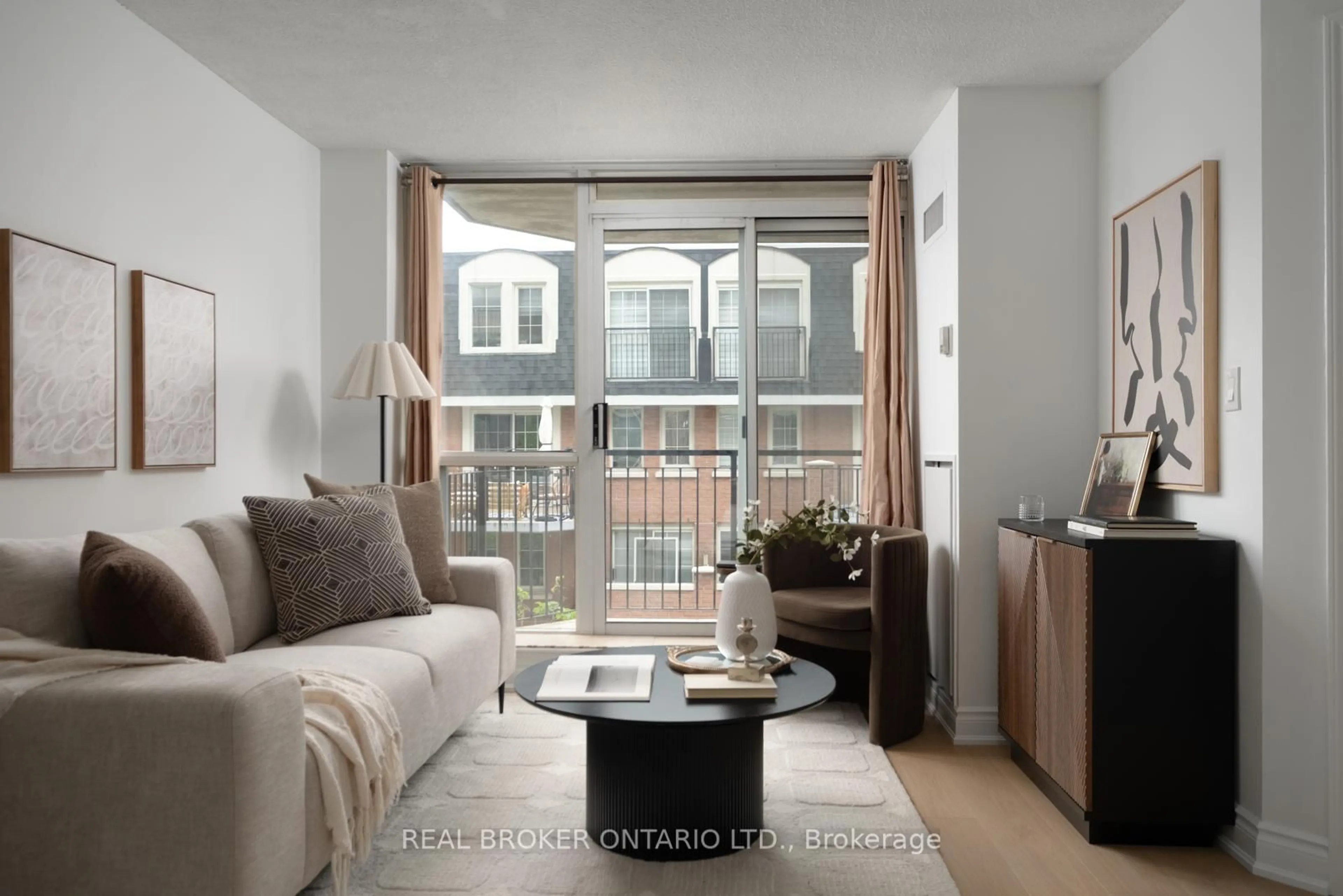 Living room with furniture, wood/laminate floor for 1000 King St #304, Toronto Ontario M6K 3N1
