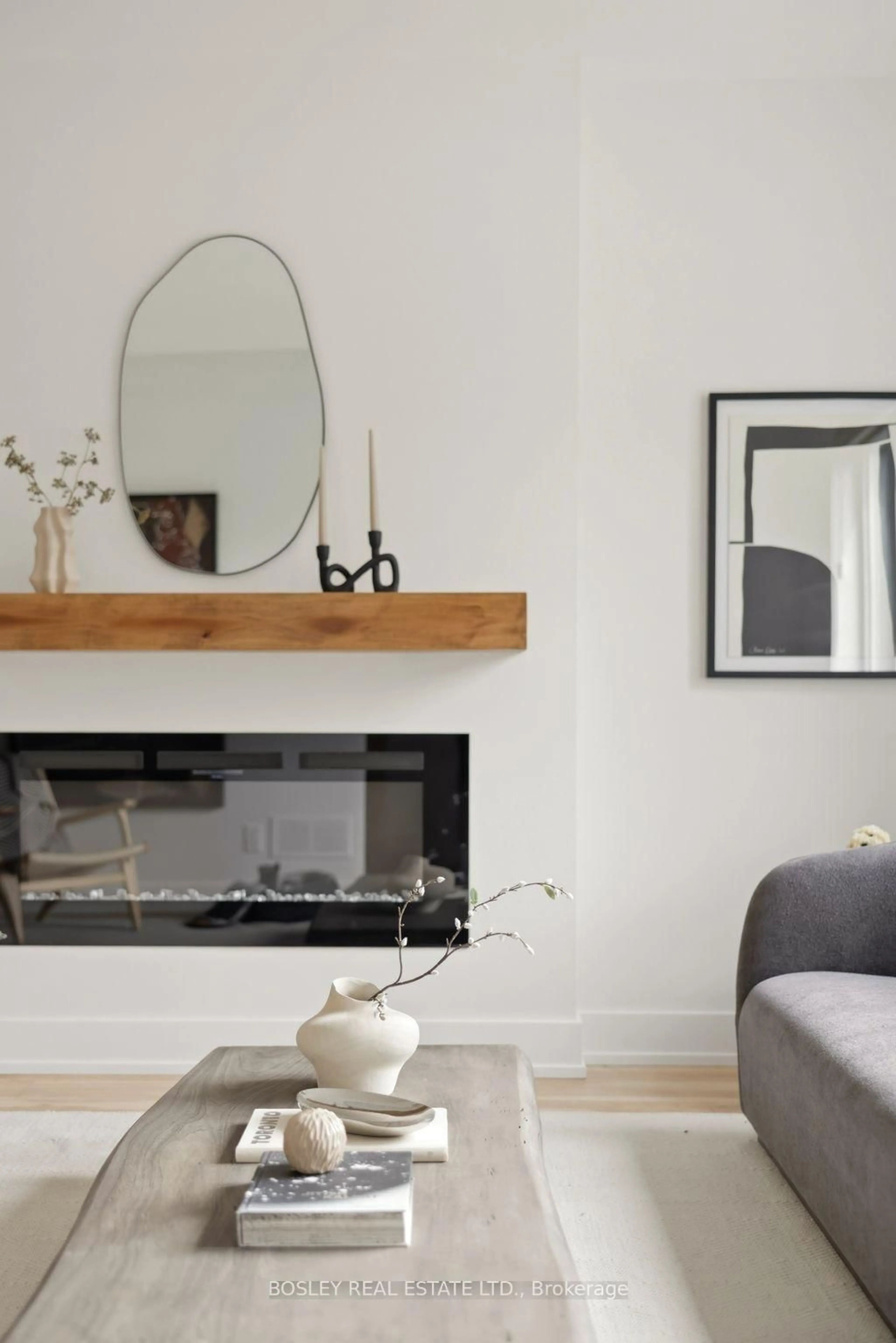 Living room with furniture, wood/laminate floor for 66 Cloverlawn Ave, Toronto Ontario M6E 1H5
