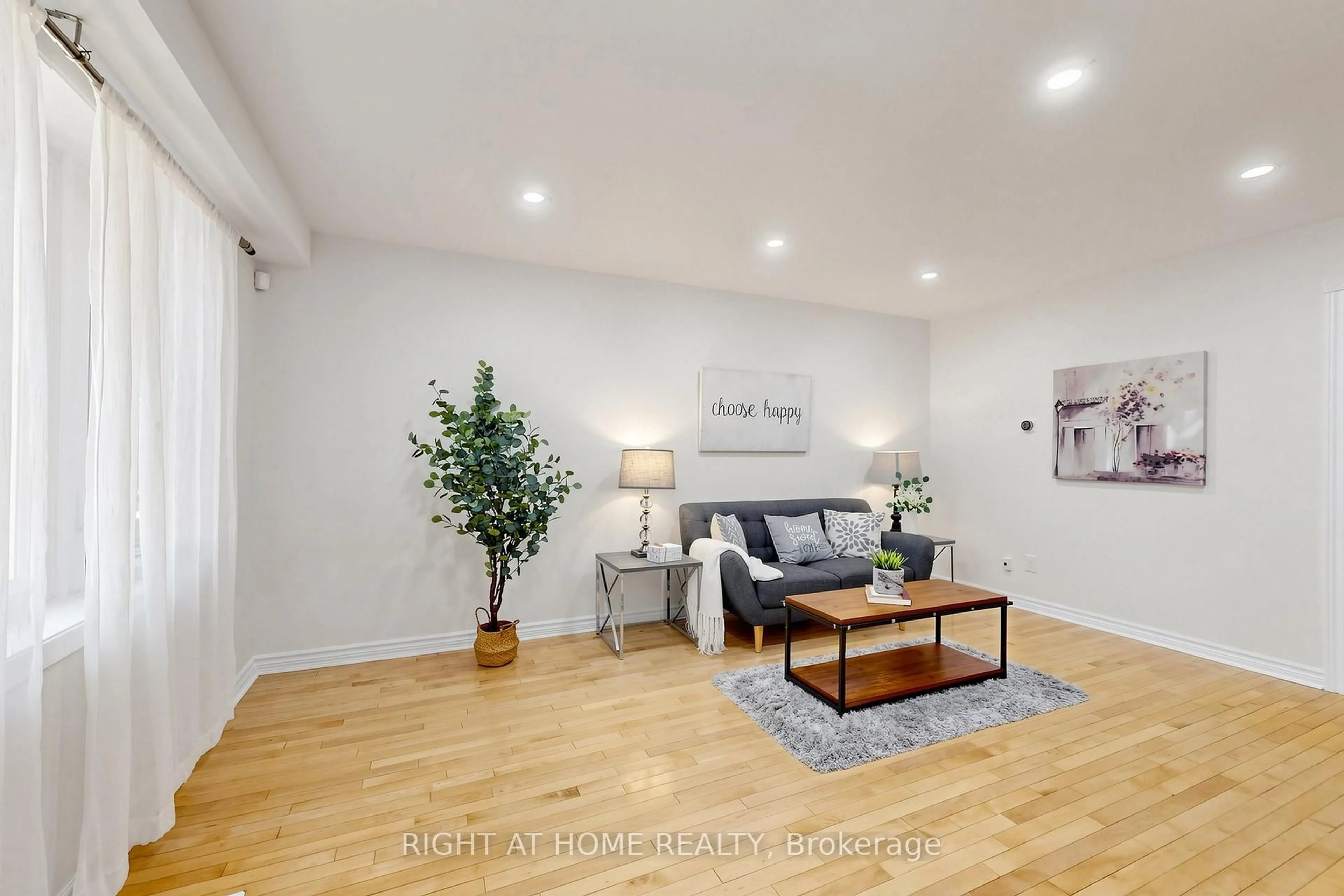 Living room with furniture, wood/laminate floor for 337 Hollyberry Tr, Toronto Ontario M2H 2P5