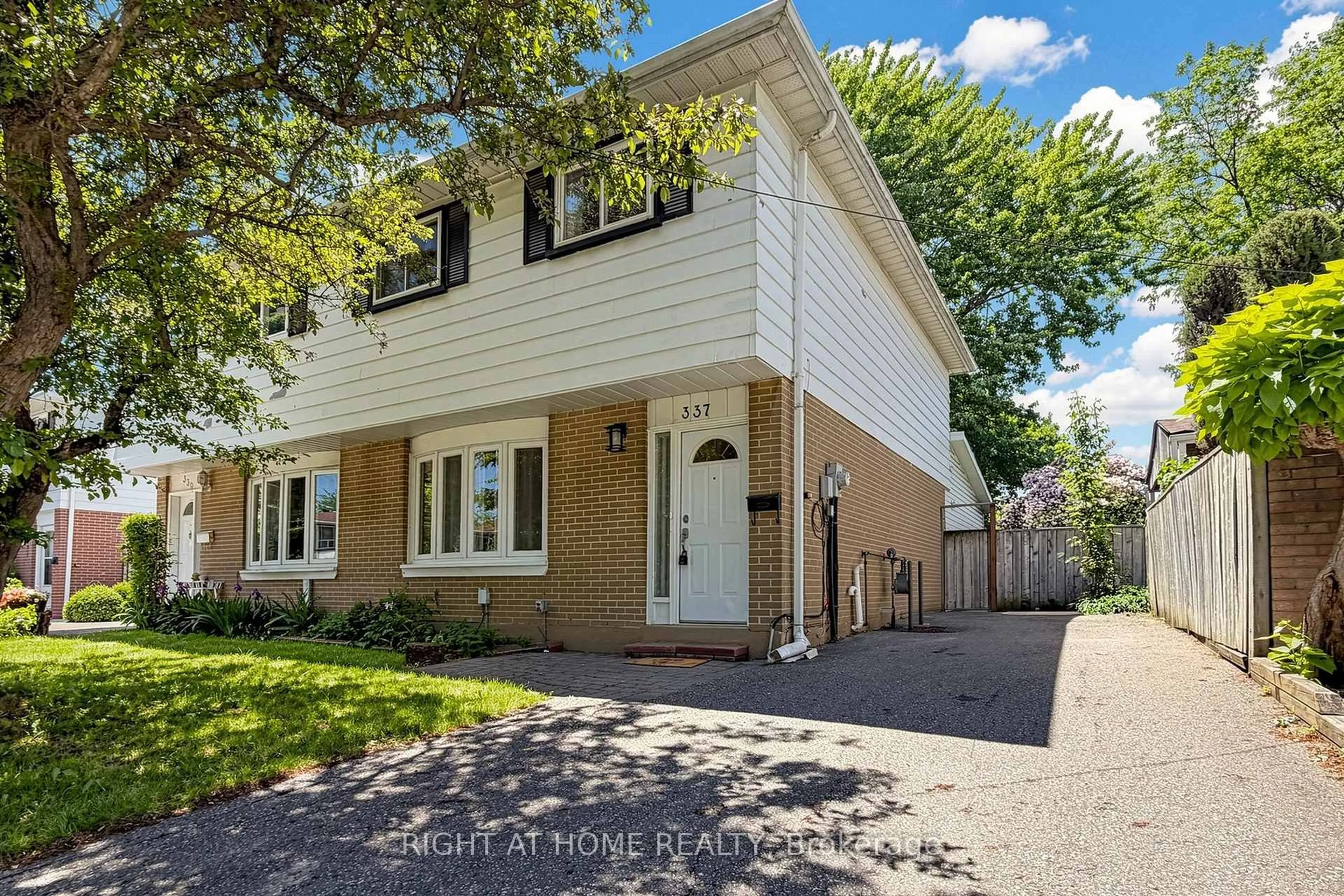 Home with brick exterior material, street for 337 Hollyberry Tr, Toronto Ontario M2H 2P5