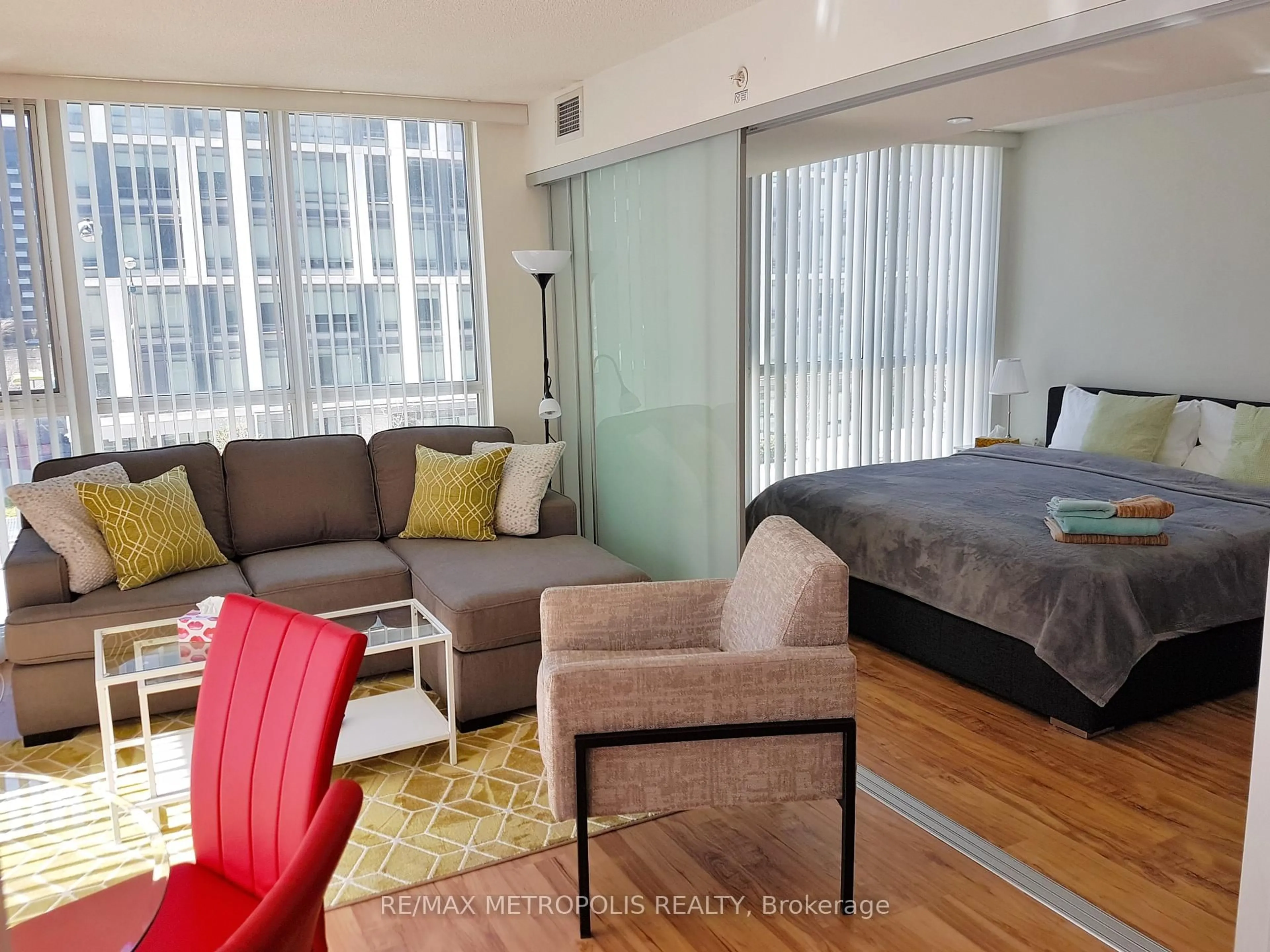 Living room with furniture, unknown for 85 Queens Wharf Rd #307, Toronto Ontario M5V 0J9