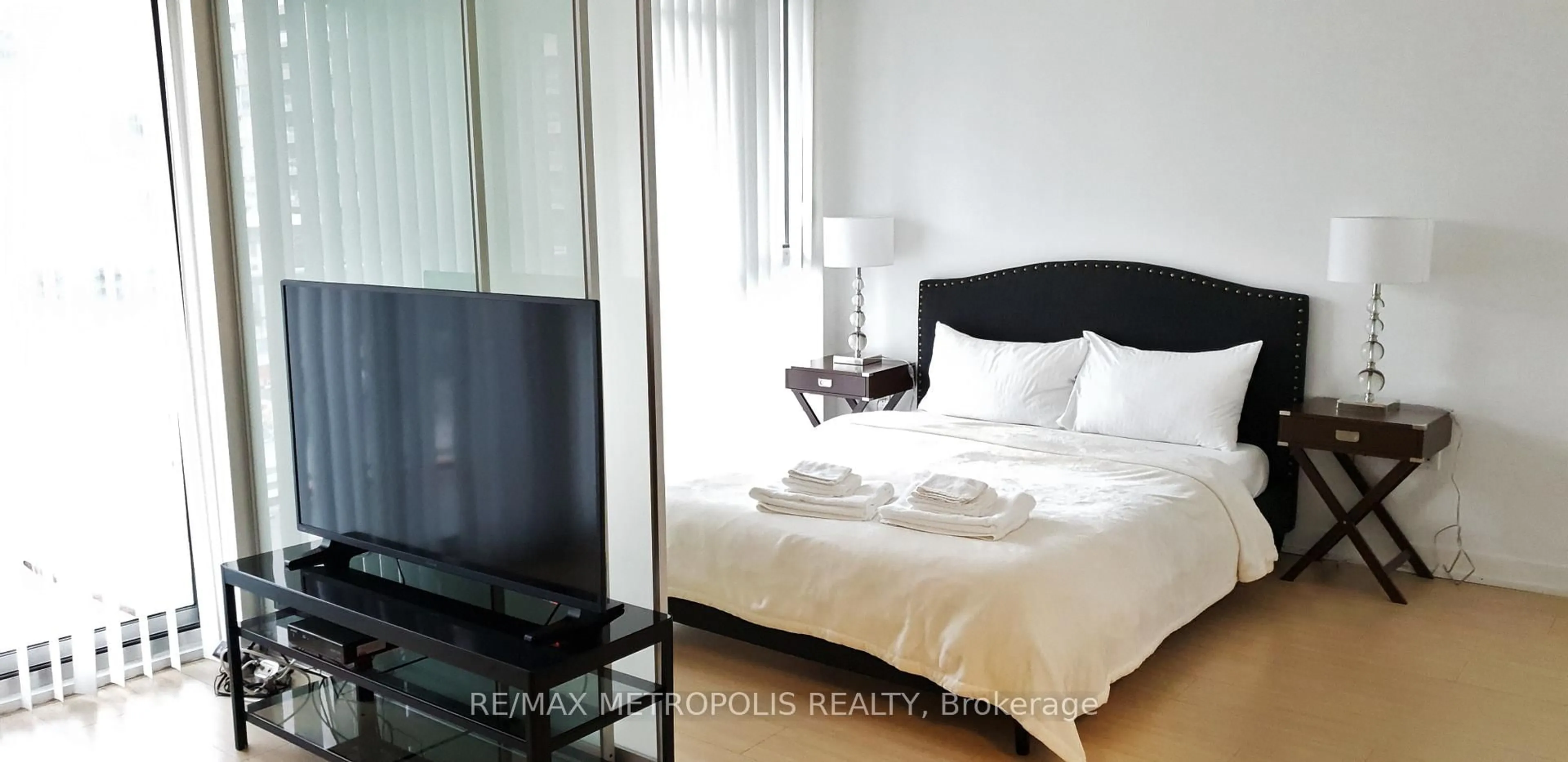 Bedroom with bed, unknown for 85 Queens Wharf Rd #526, Toronto Ontario M5V 0J9
