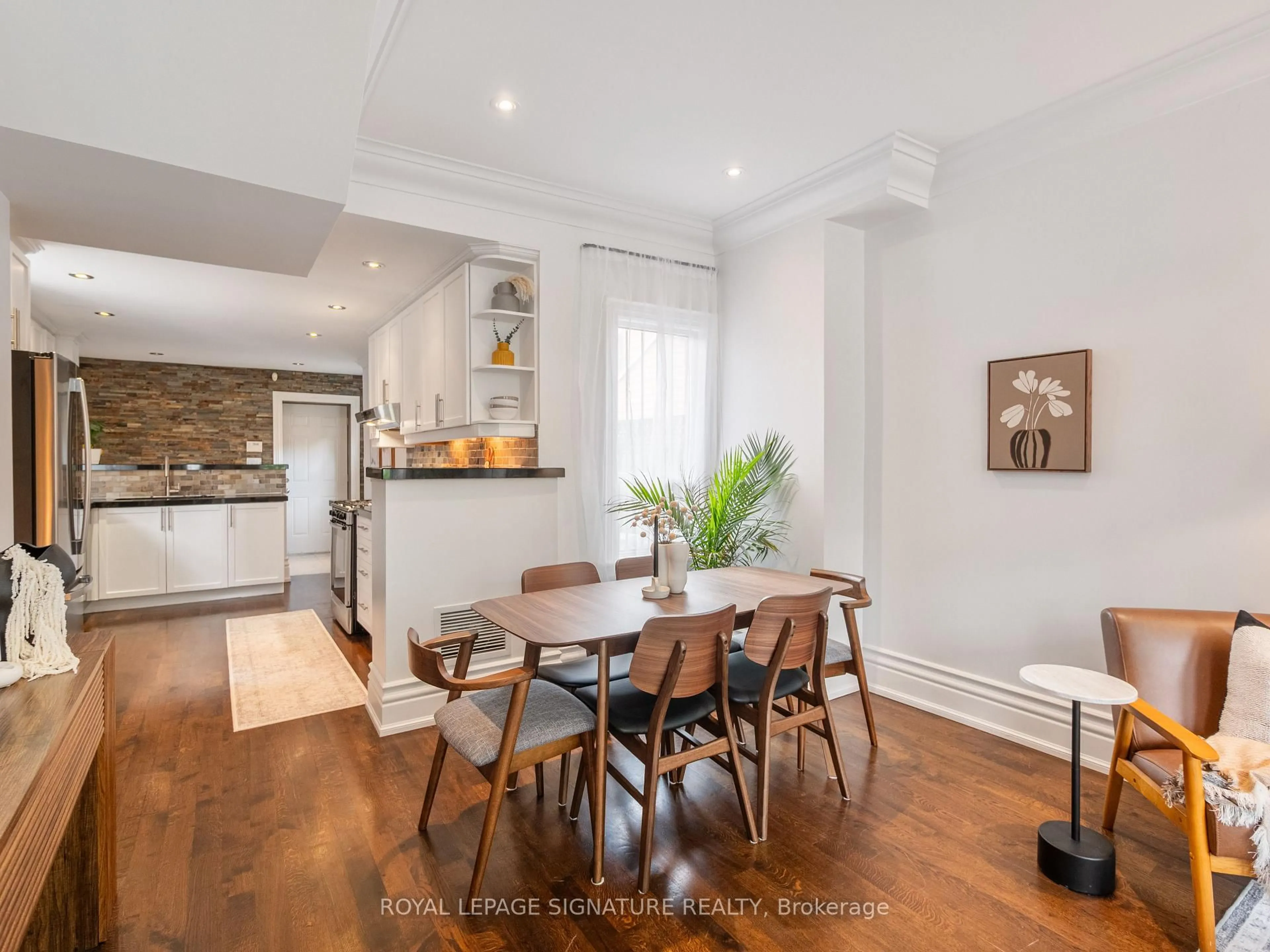 Open concept kitchen, wood/laminate floor for 4 Whitaker Ave, Toronto Ontario M6J 1A1