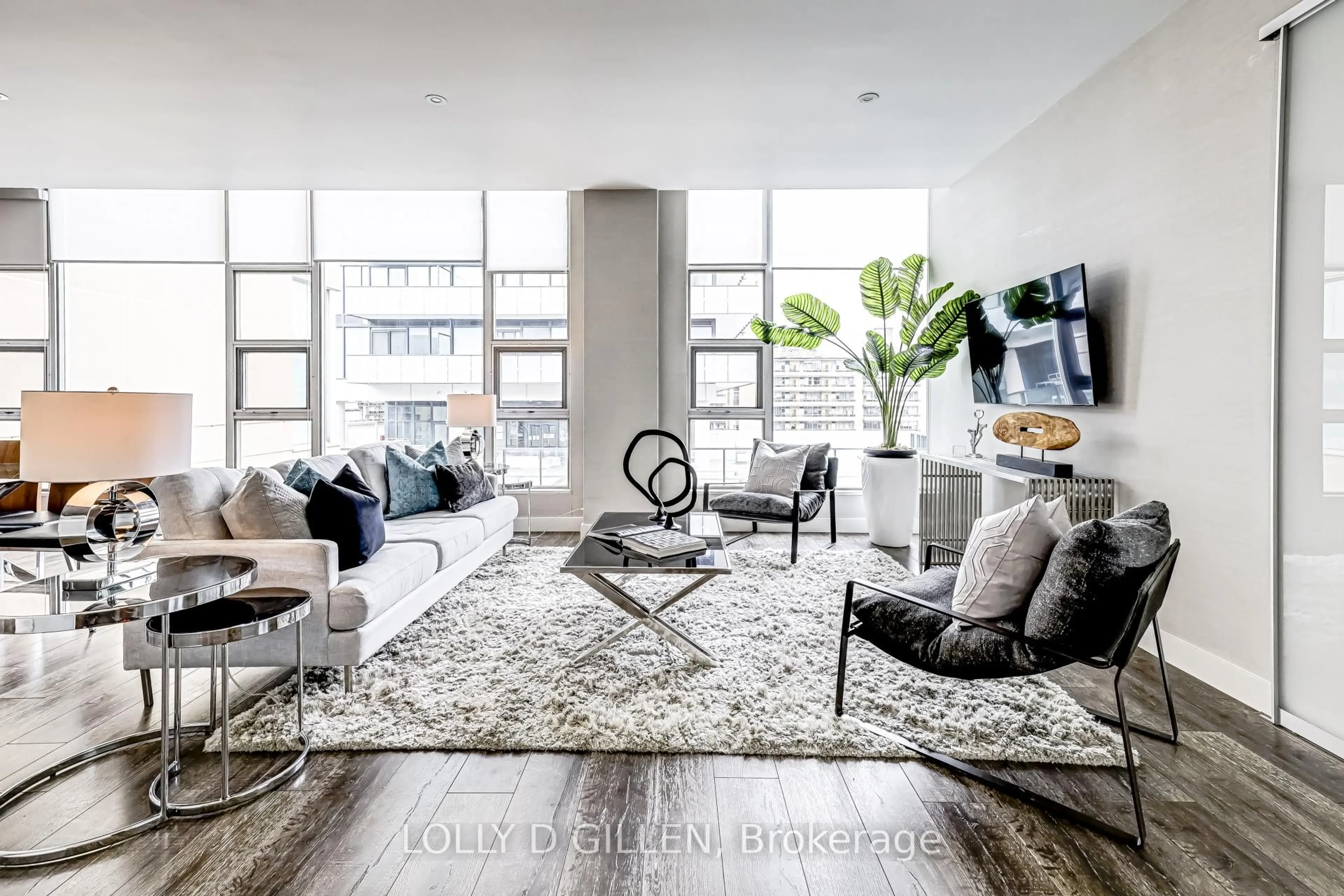 Living room with furniture, cement floor for 188 Eglinton Ave #Ph806, Toronto Ontario M4P 2X7