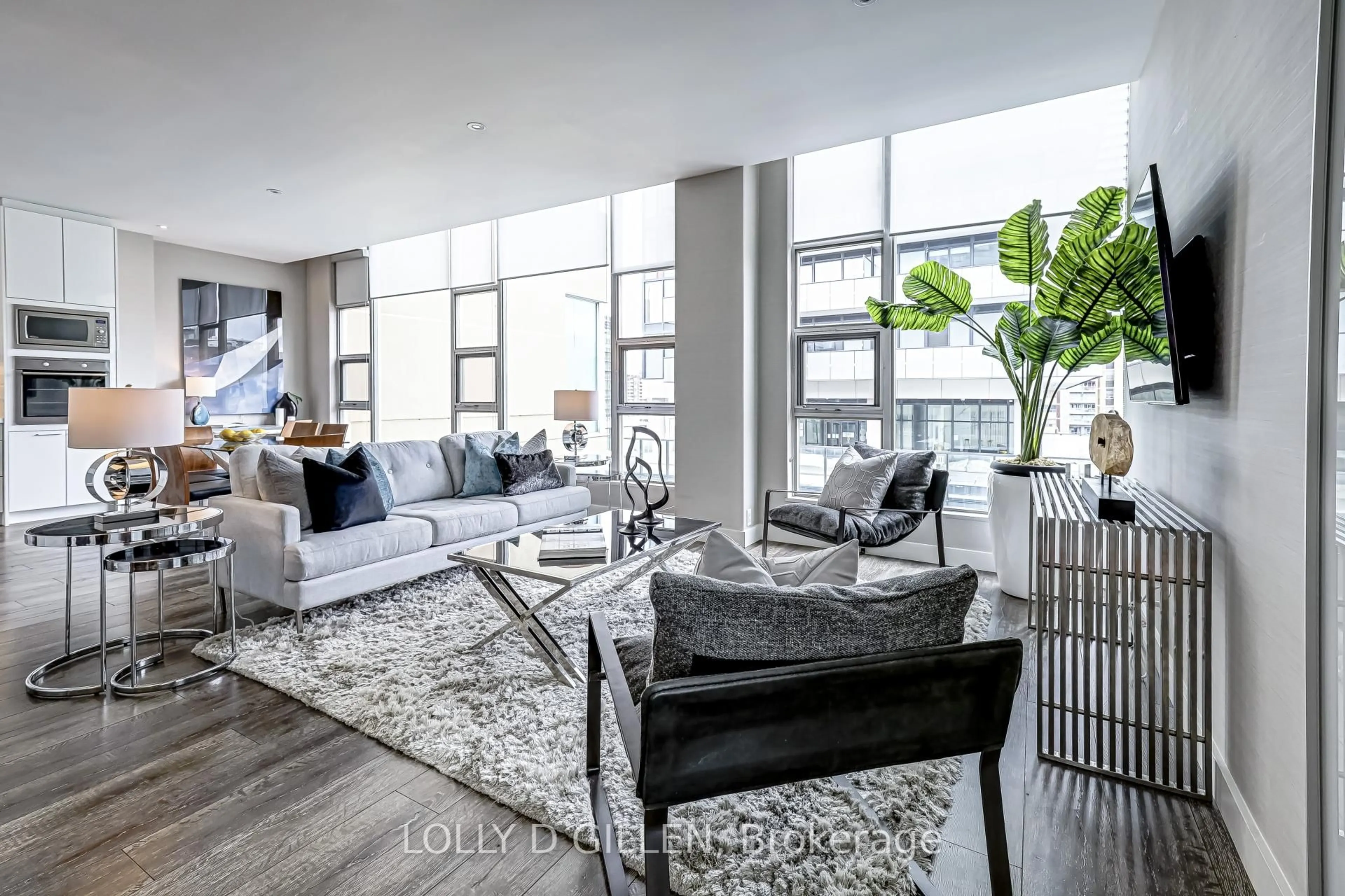 Living room with furniture, cement floor for 188 Eglinton Ave #Ph806, Toronto Ontario M4P 2X7