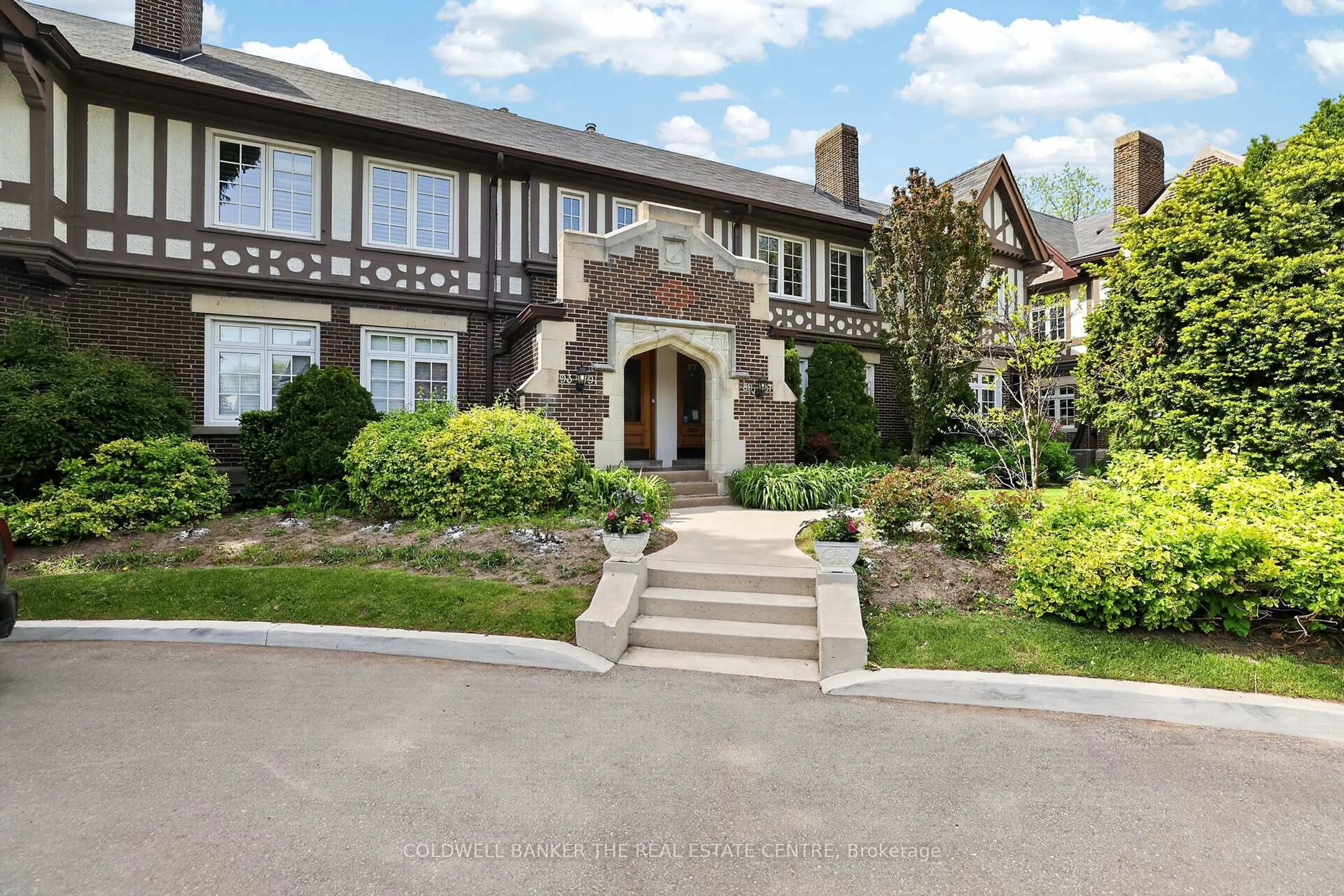 Home with brick exterior material, street for 93B Douglas Cres #B, Toronto Ontario M4W 2E6