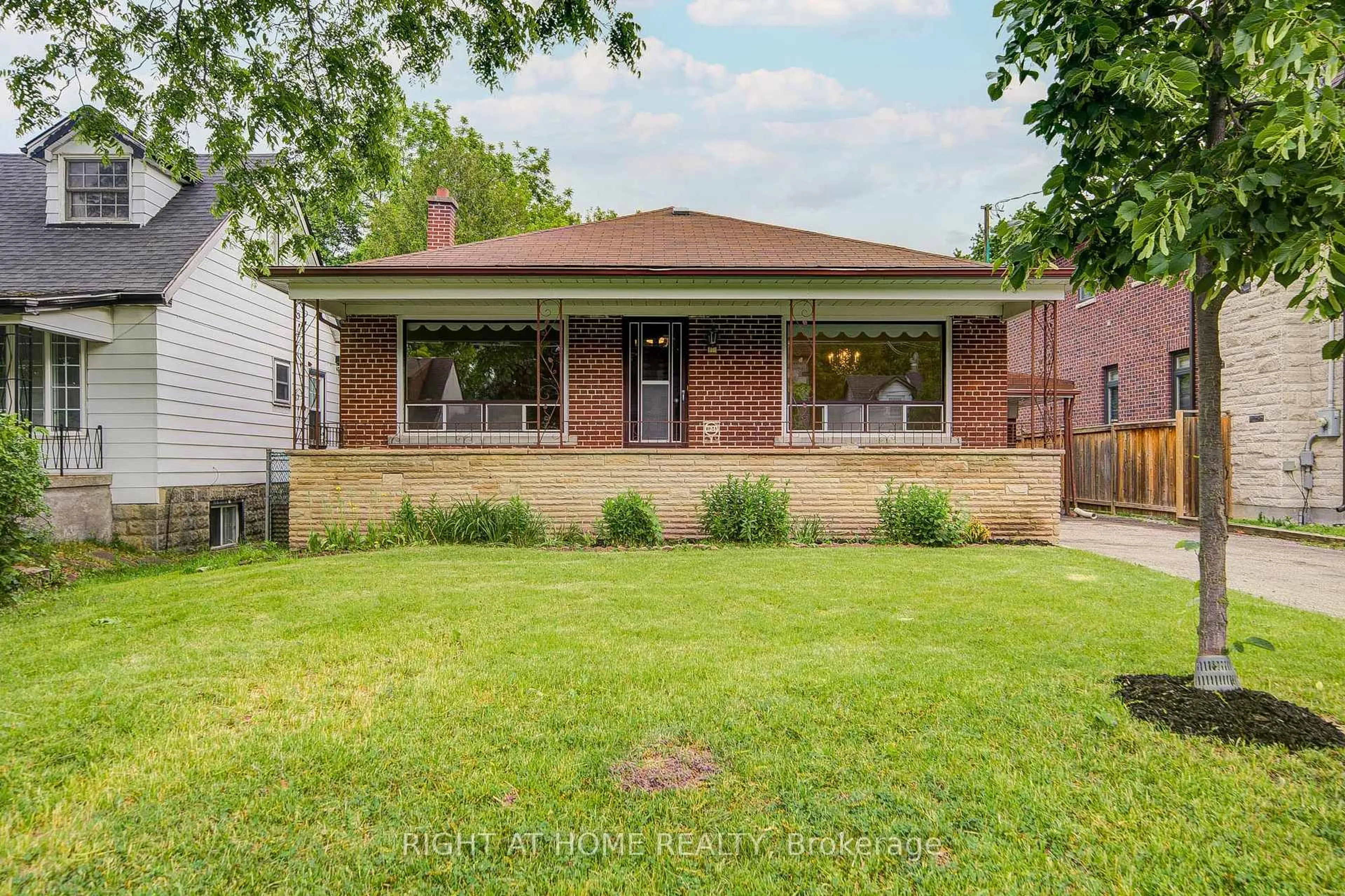 Home with brick exterior material, street for 124 Patricia Ave, Toronto Ontario M2M 1J4