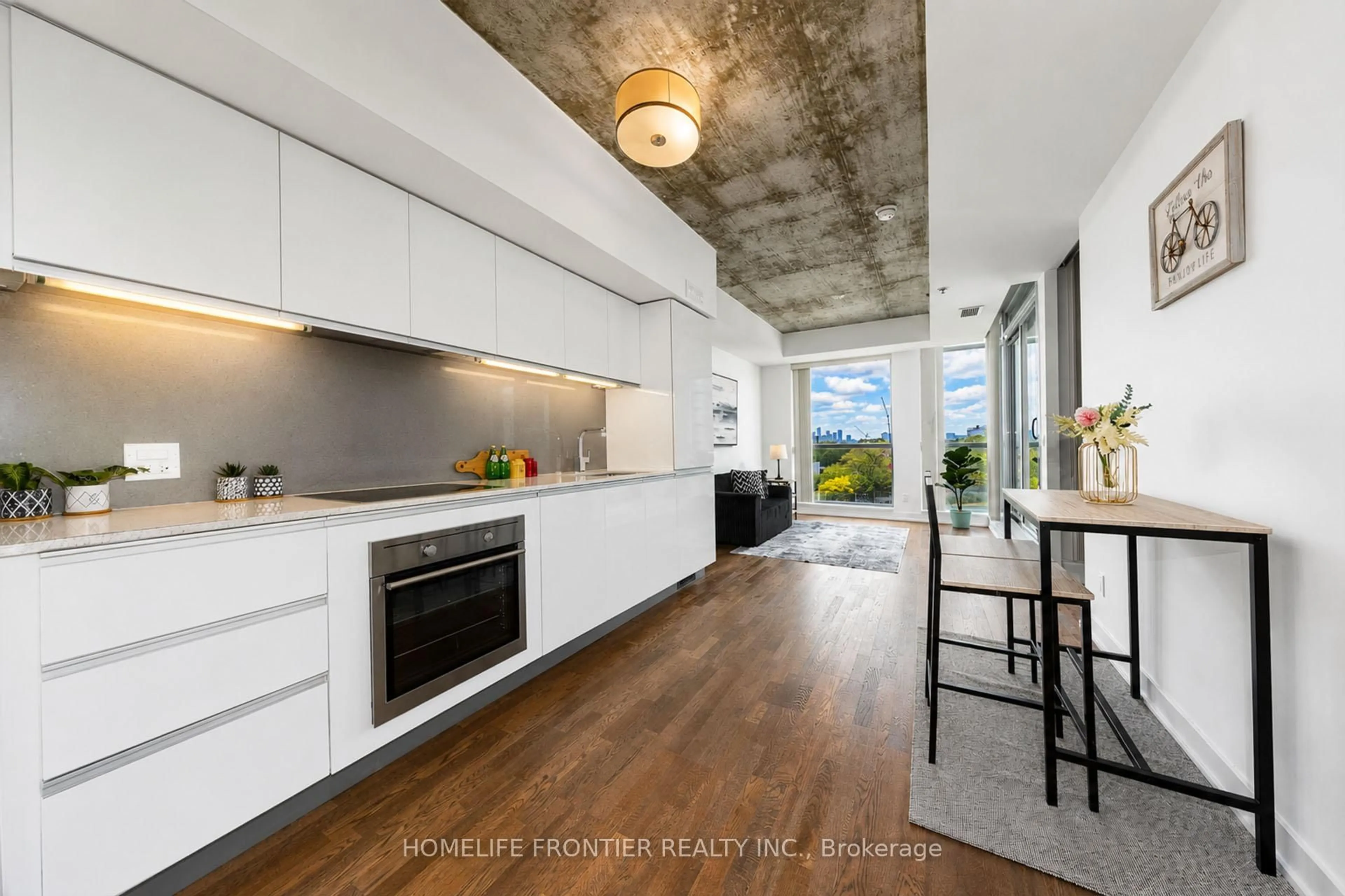 Open concept kitchen, unknown for 20 Minowan Miikan Lane #717, Toronto Ontario M6J 0E5