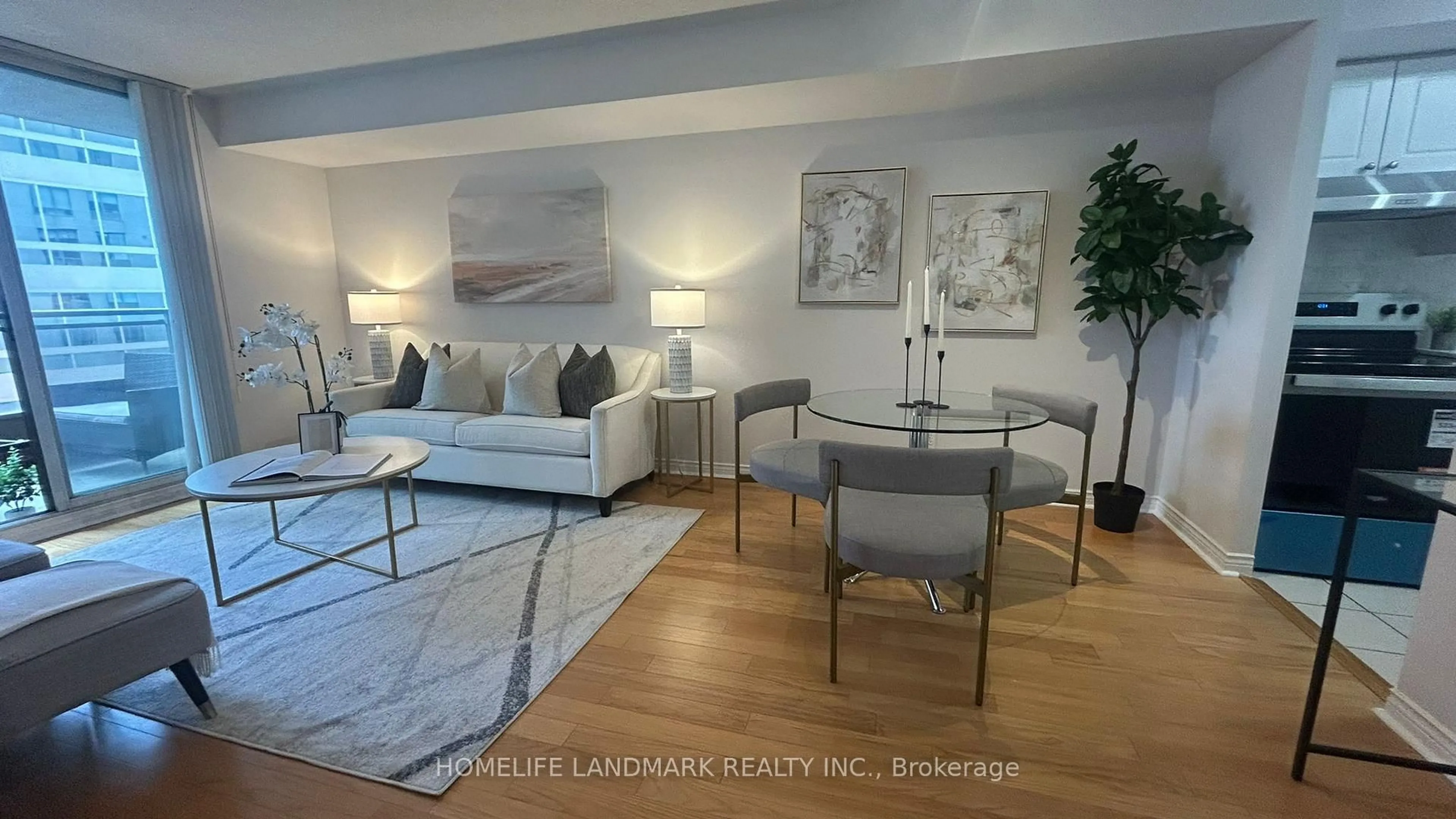 Living room with furniture, wood/laminate floor for 260 Doris Ave #1201, Toronto Ontario M2N 6X9