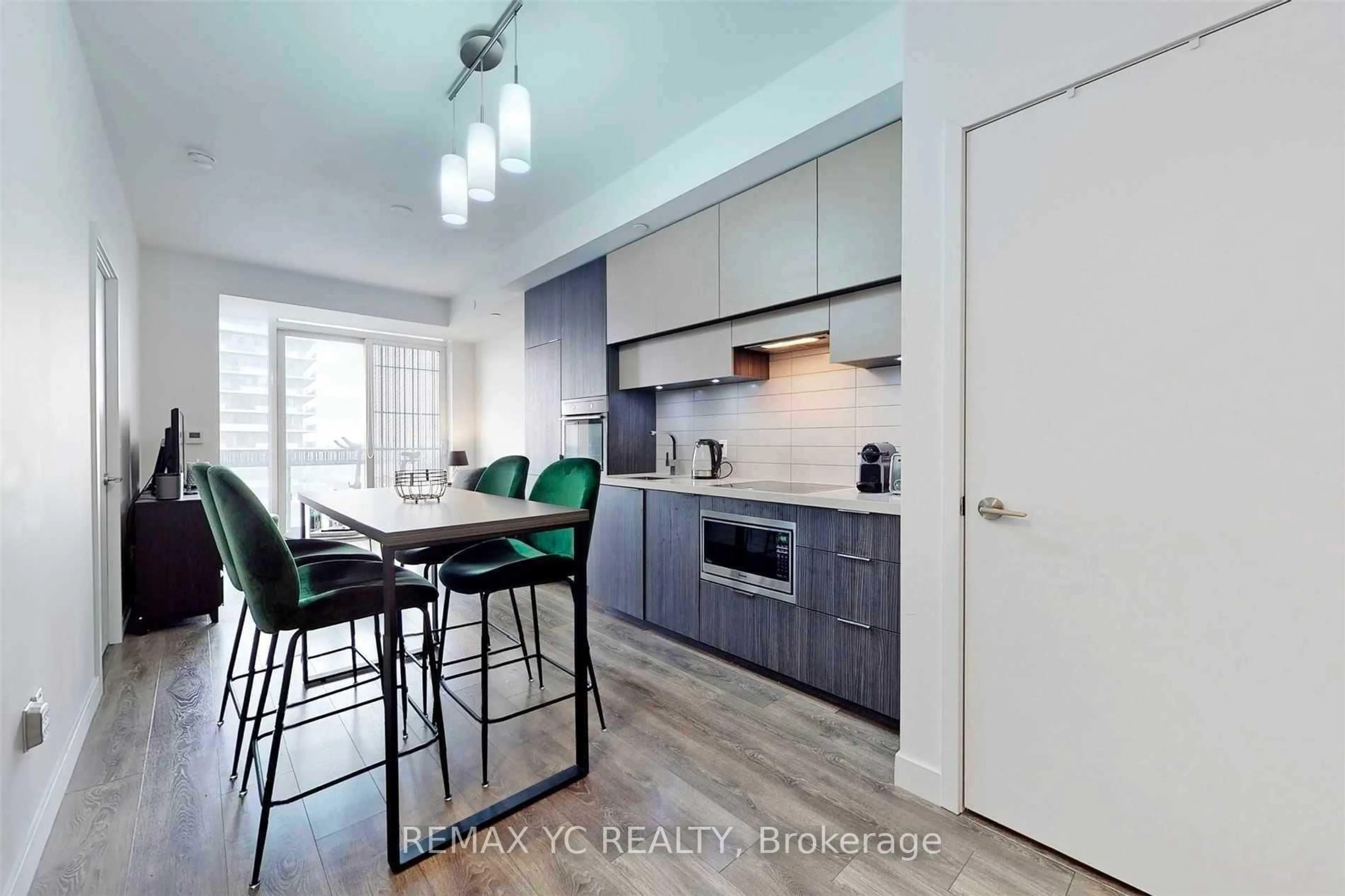 Open concept kitchen, wood/laminate floor for 8 Eglinton Ave #2212, Toronto Ontario M4P 0C1