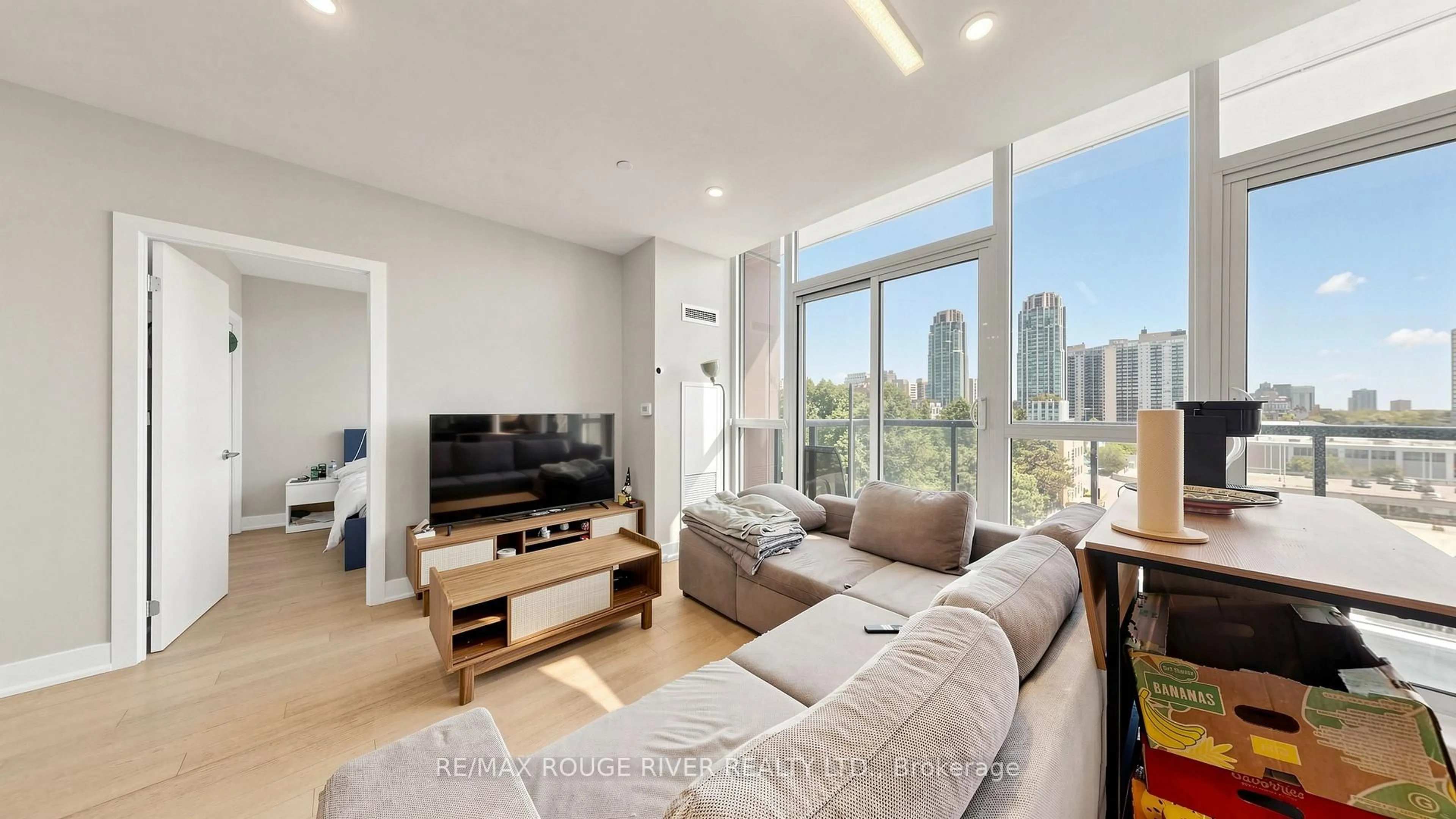 Living room with furniture, wood/laminate floor for 1486 Bathurst St #503, Toronto Ontario M5P 0A5