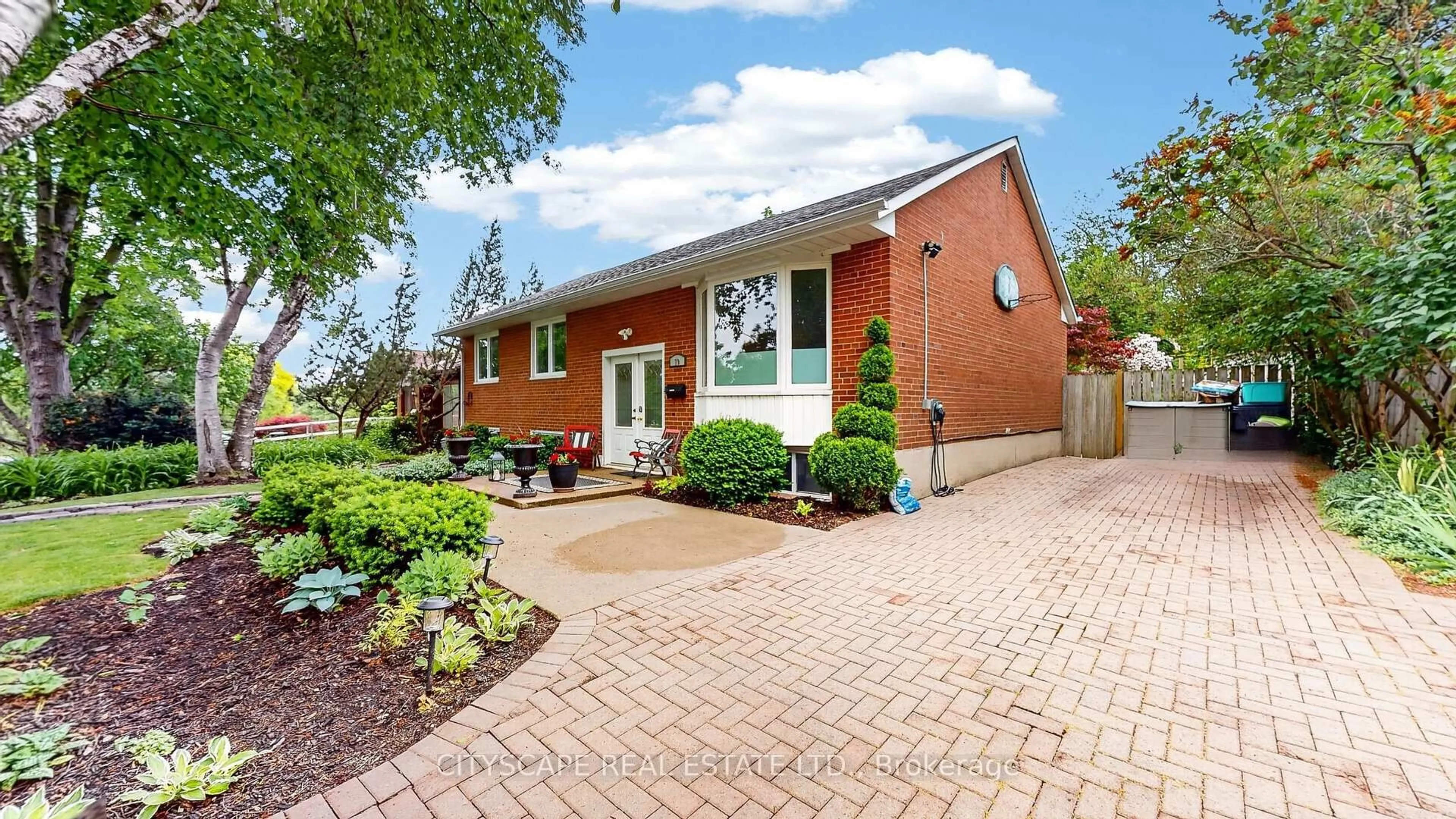Home with brick exterior material, street for 79 Paperbirch Dr, Toronto Ontario M3C 2E6