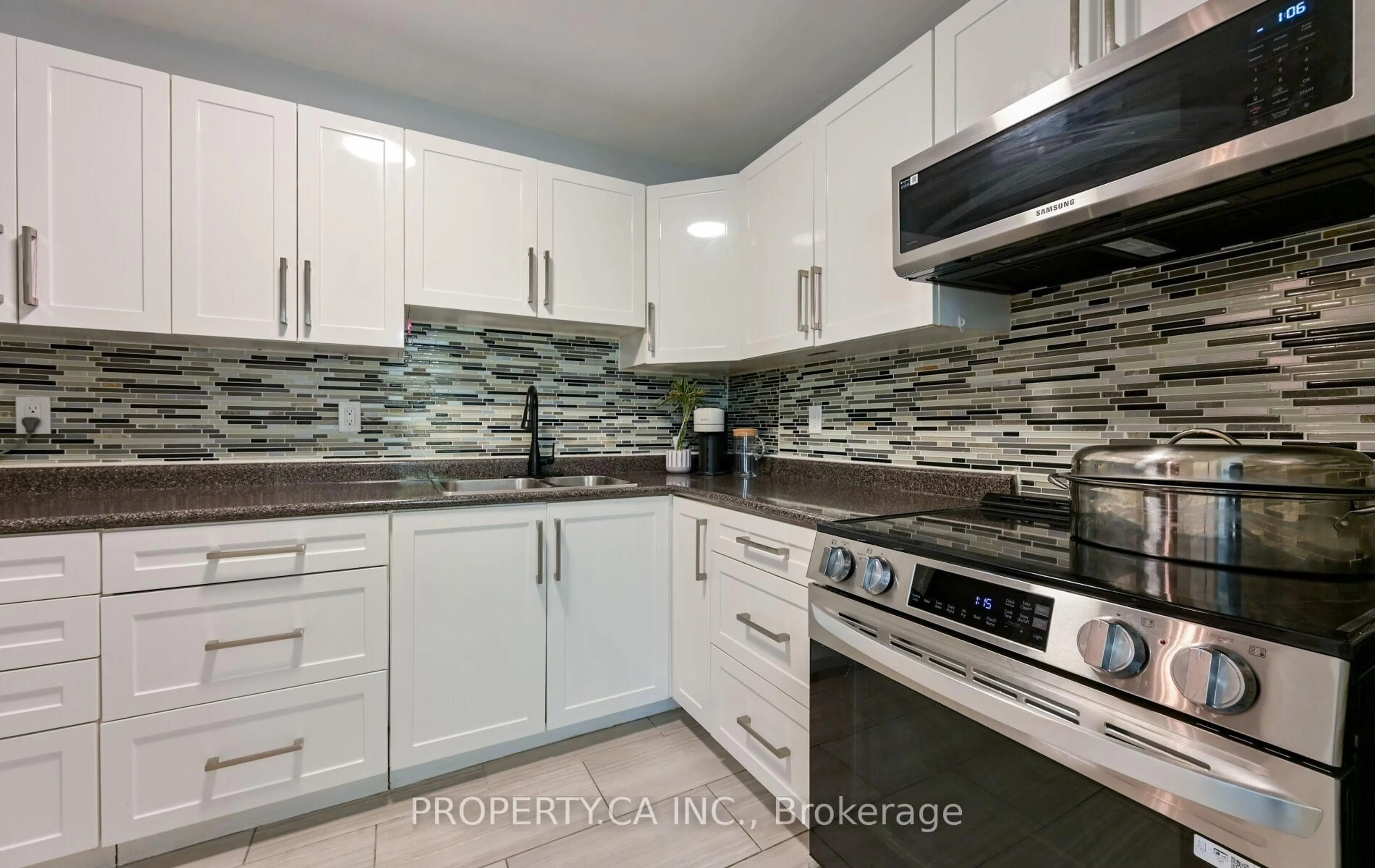 Standard kitchen, ceramic/tile floor for 60 Pavane Linkway #207, Toronto Ontario M3C 1A1