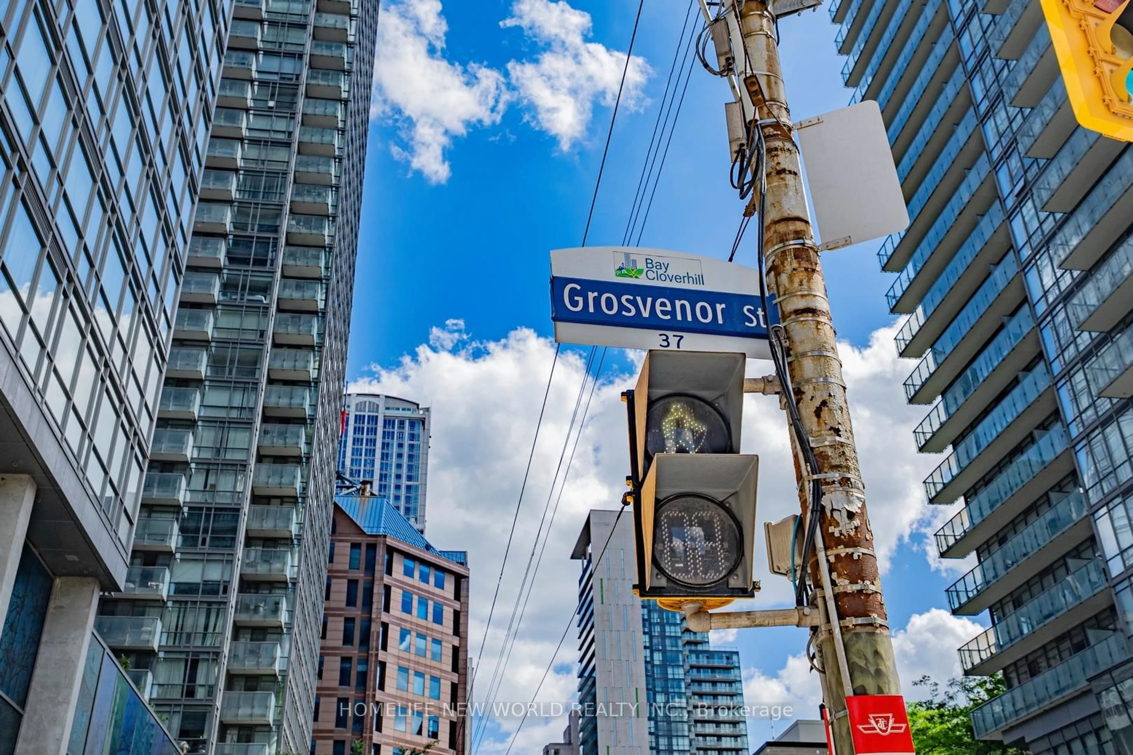 A pic from outside/outdoor area/front of a property/back of a property/a pic from drone, street for 37 Grosvenor St #607, Toronto Ontario M4Y 3G5