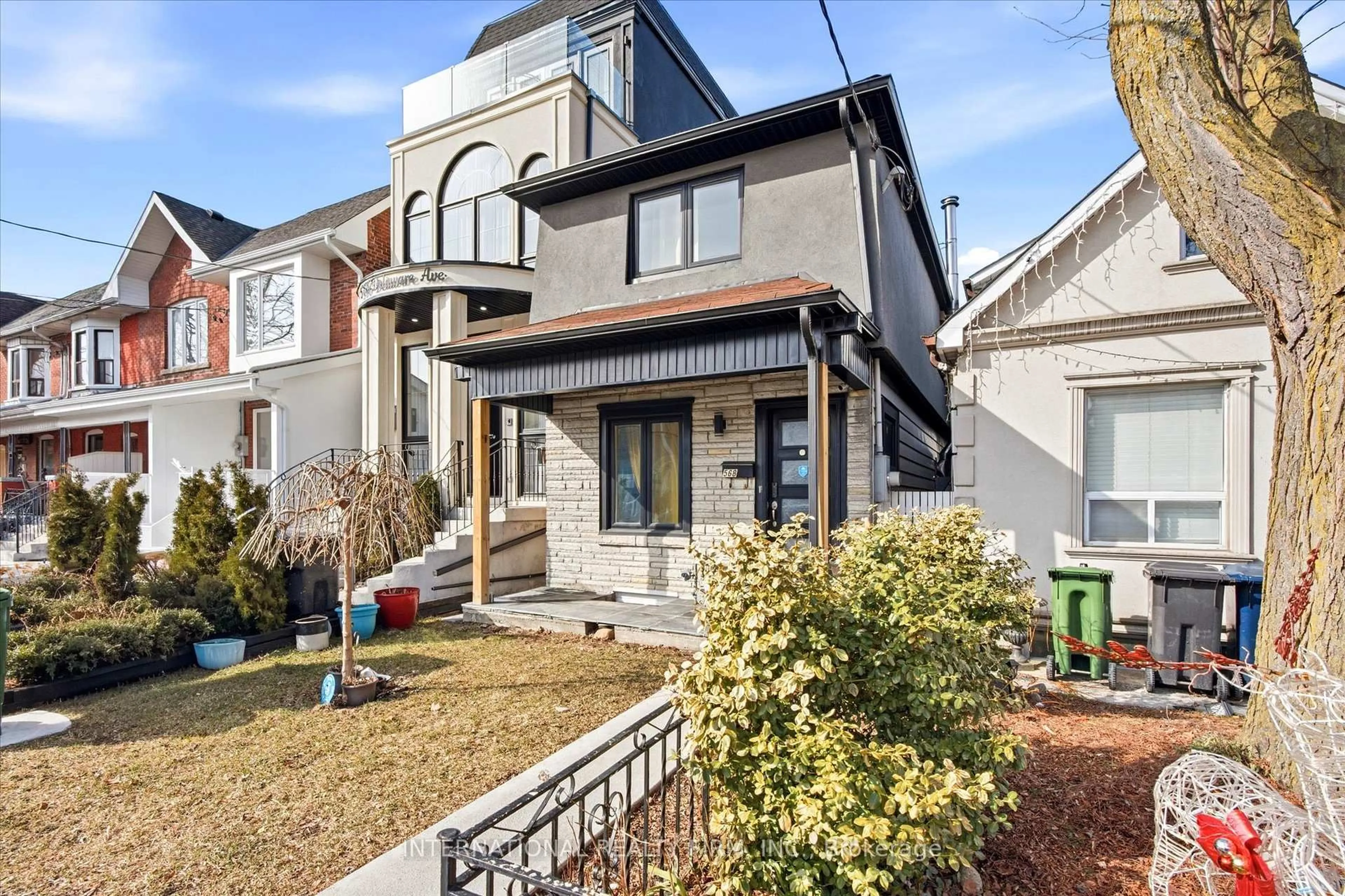 Home with brick exterior material, street for 568 Delaware Ave, Toronto Ontario M6H 2V2