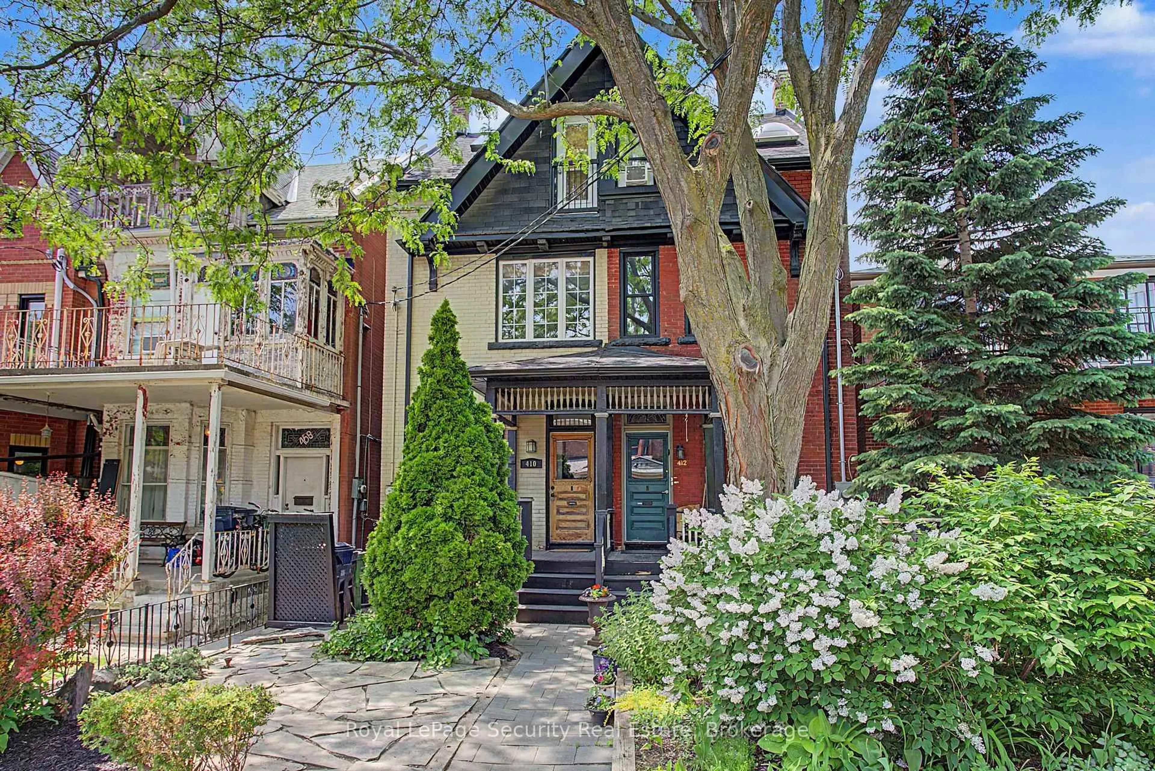 Home with brick exterior material, street for 410 Manning Ave, Toronto Ontario M6G 2V7