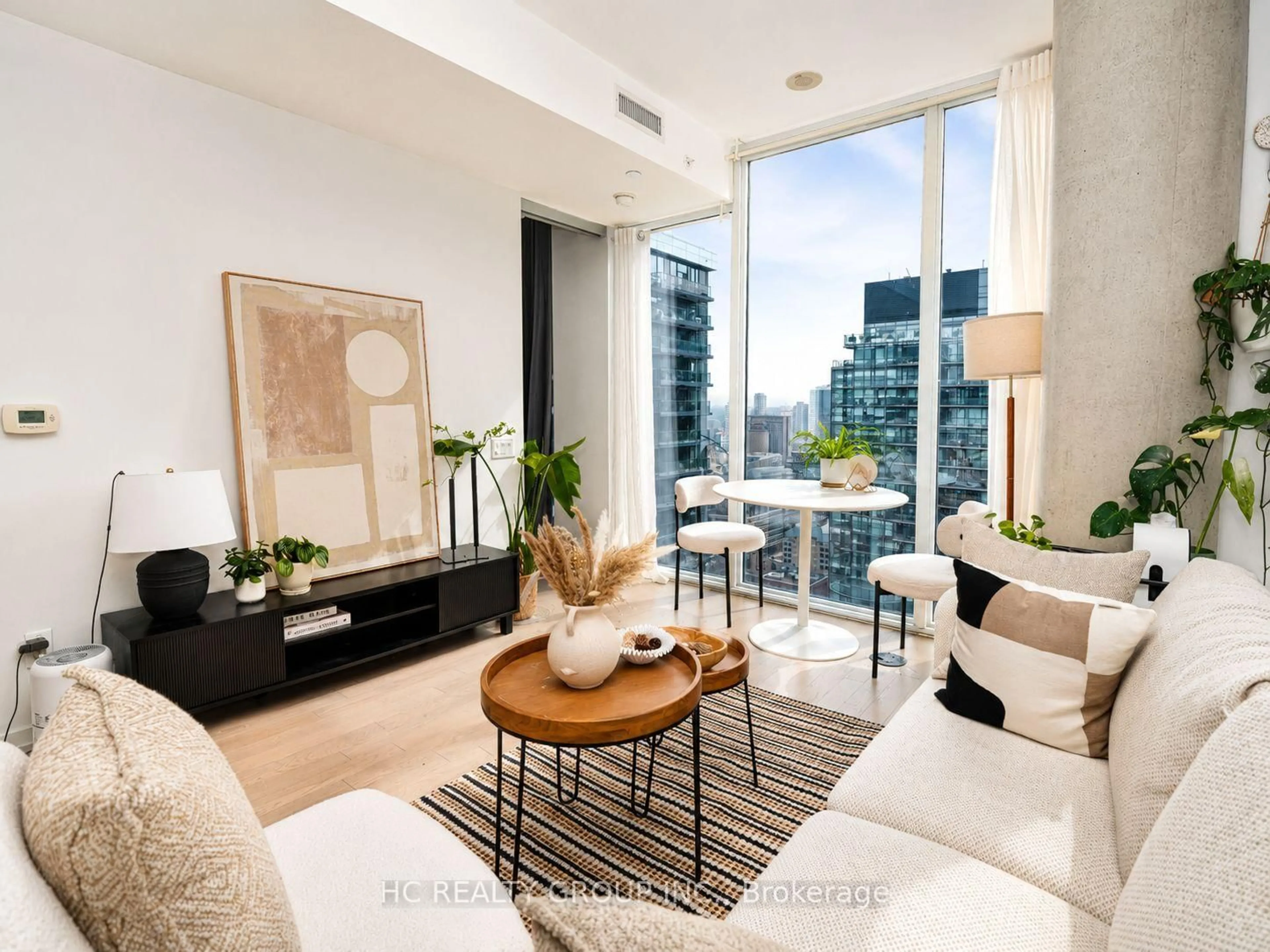 Living room with furniture, unknown for 101 Peter St #3906, Toronto Ontario M5V 2G9
