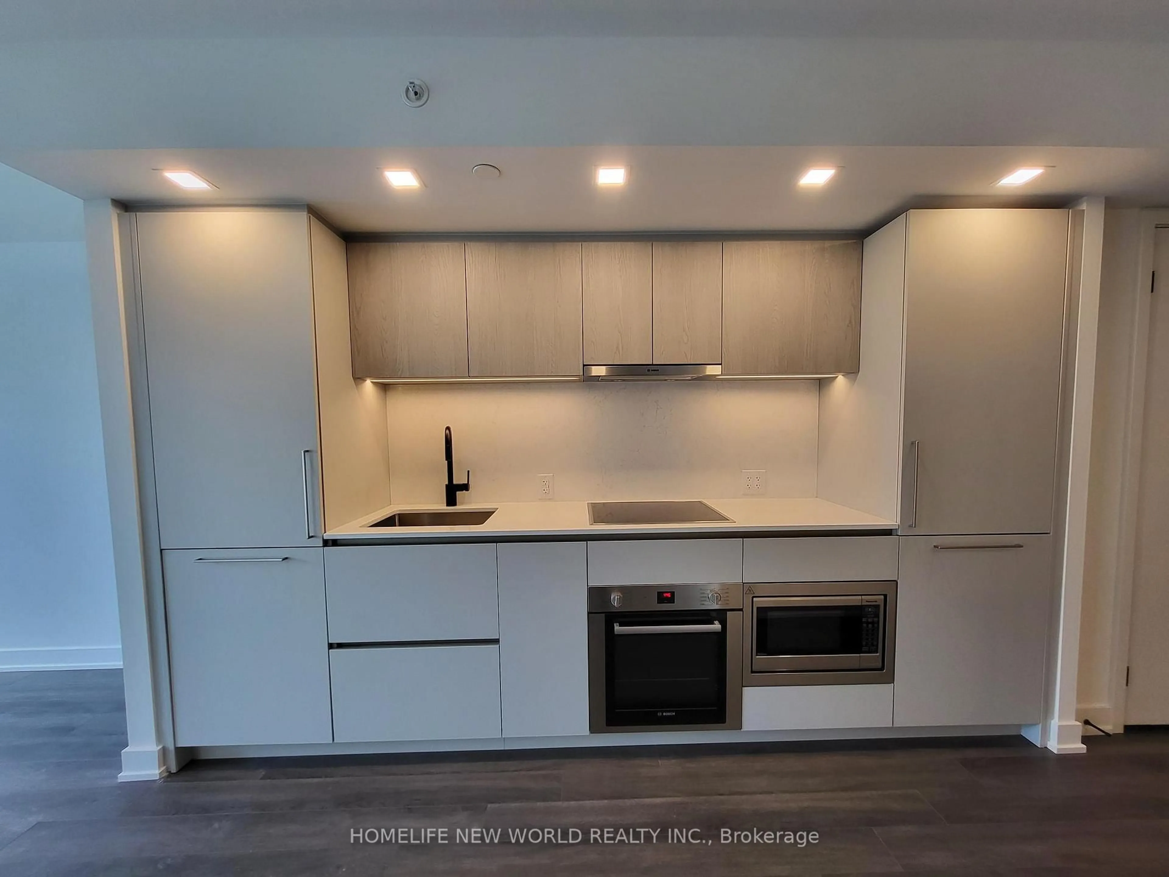 Open concept kitchen, wood/laminate floor for 609 Sherbourne St #901, Toronto Ontario M4X 0A4