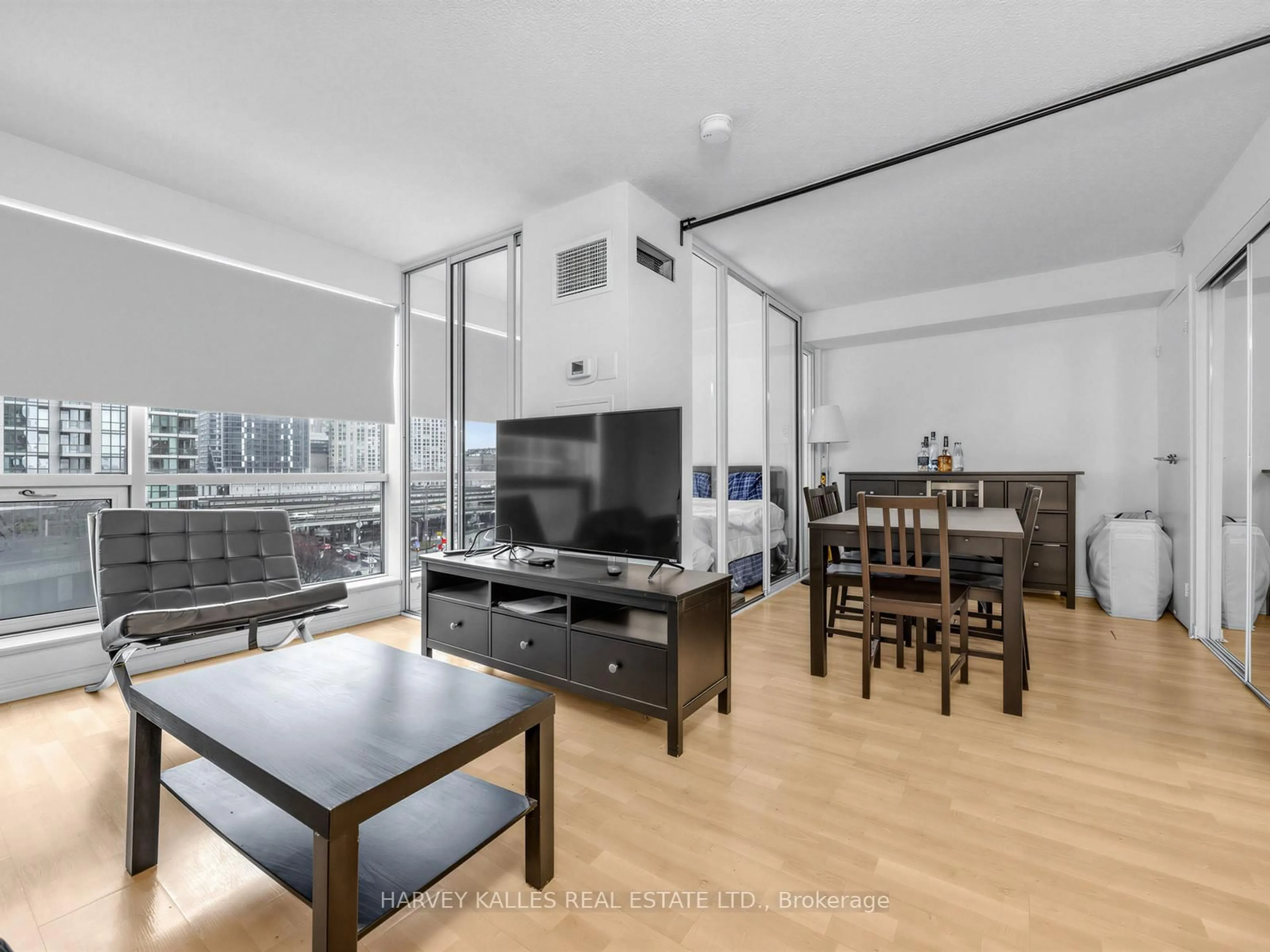Living room with furniture, wood/laminate floor for 10 Yonge St #705, Toronto Ontario M5J 1R4
