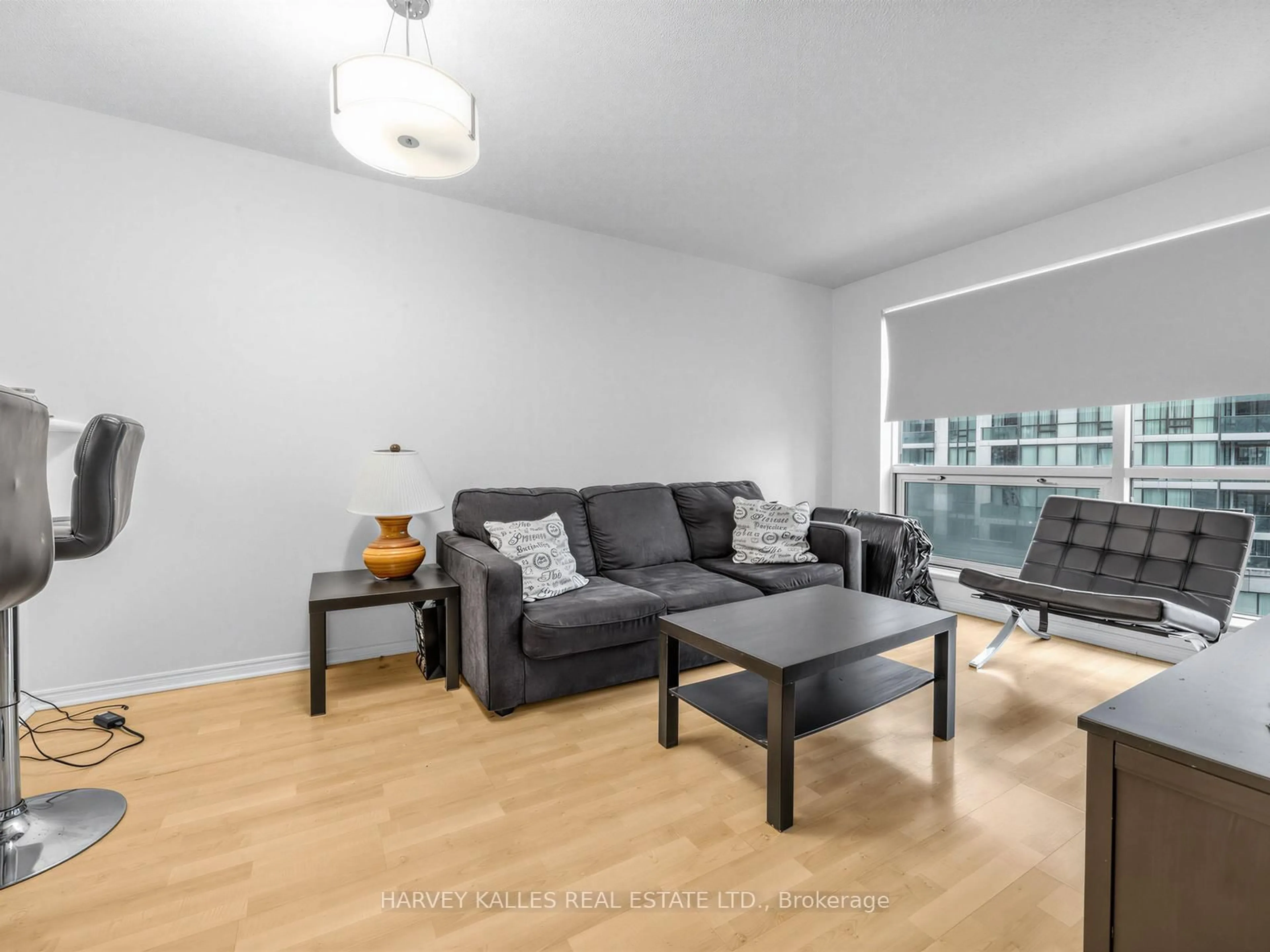 Living room with furniture, wood/laminate floor for 10 Yonge St #705, Toronto Ontario M5J 1R4