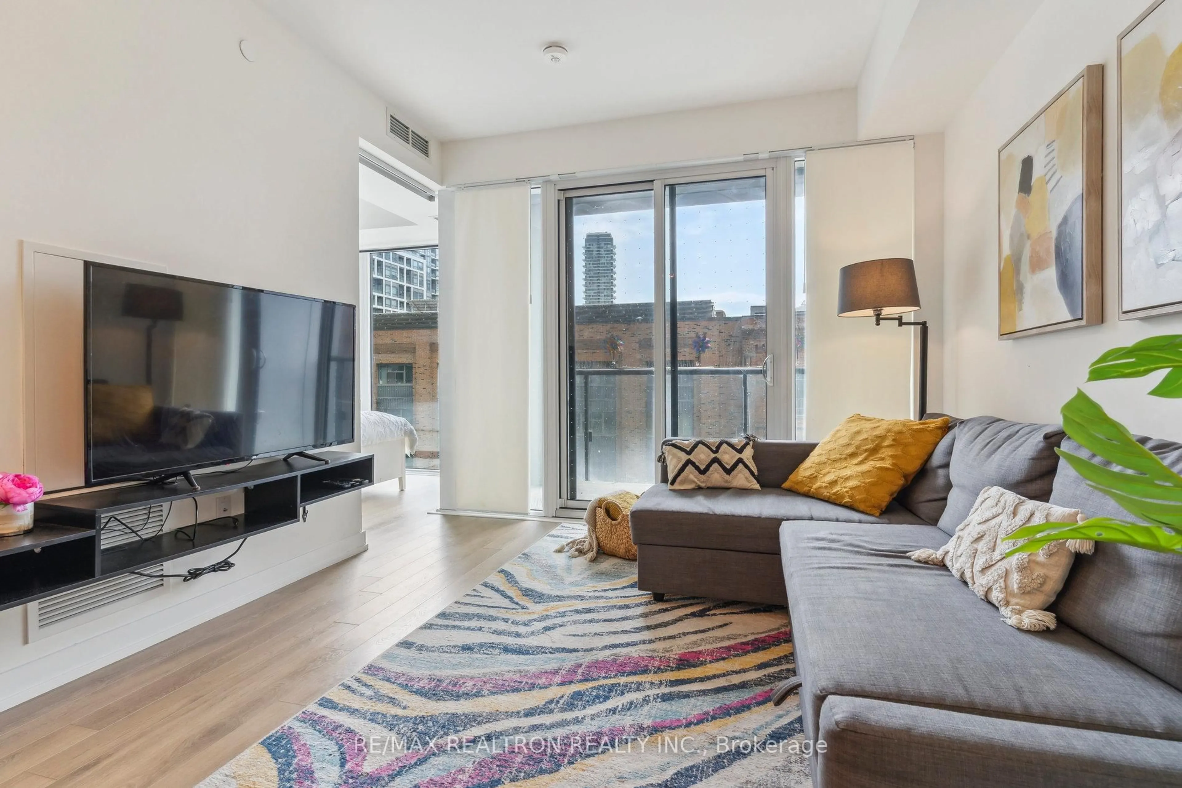 Living room with furniture, unknown for 158 Front St #325, Toronto Ontario M5A 0K9