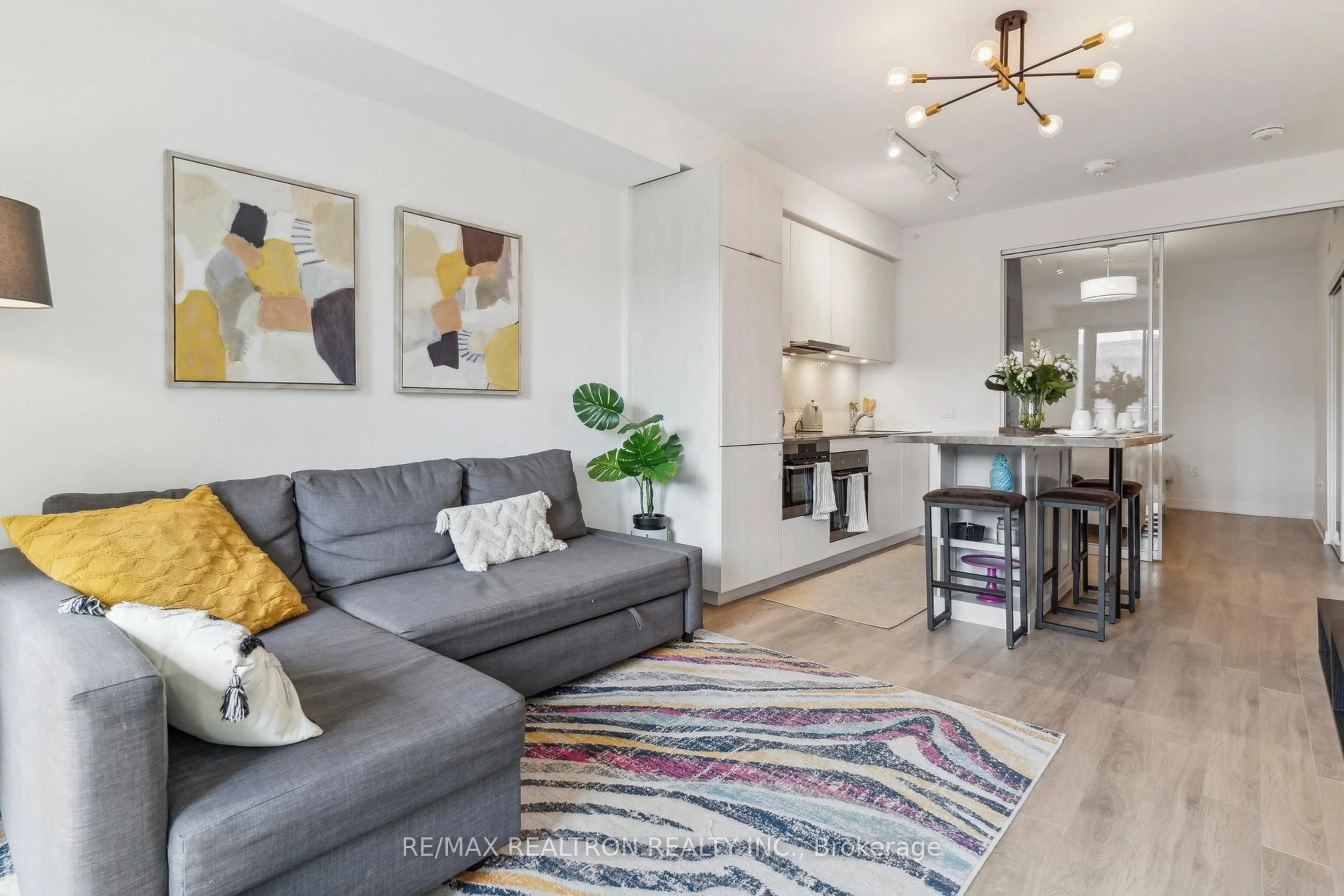 Living room with furniture, unknown for 158 Front St #325, Toronto Ontario M5A 0K9