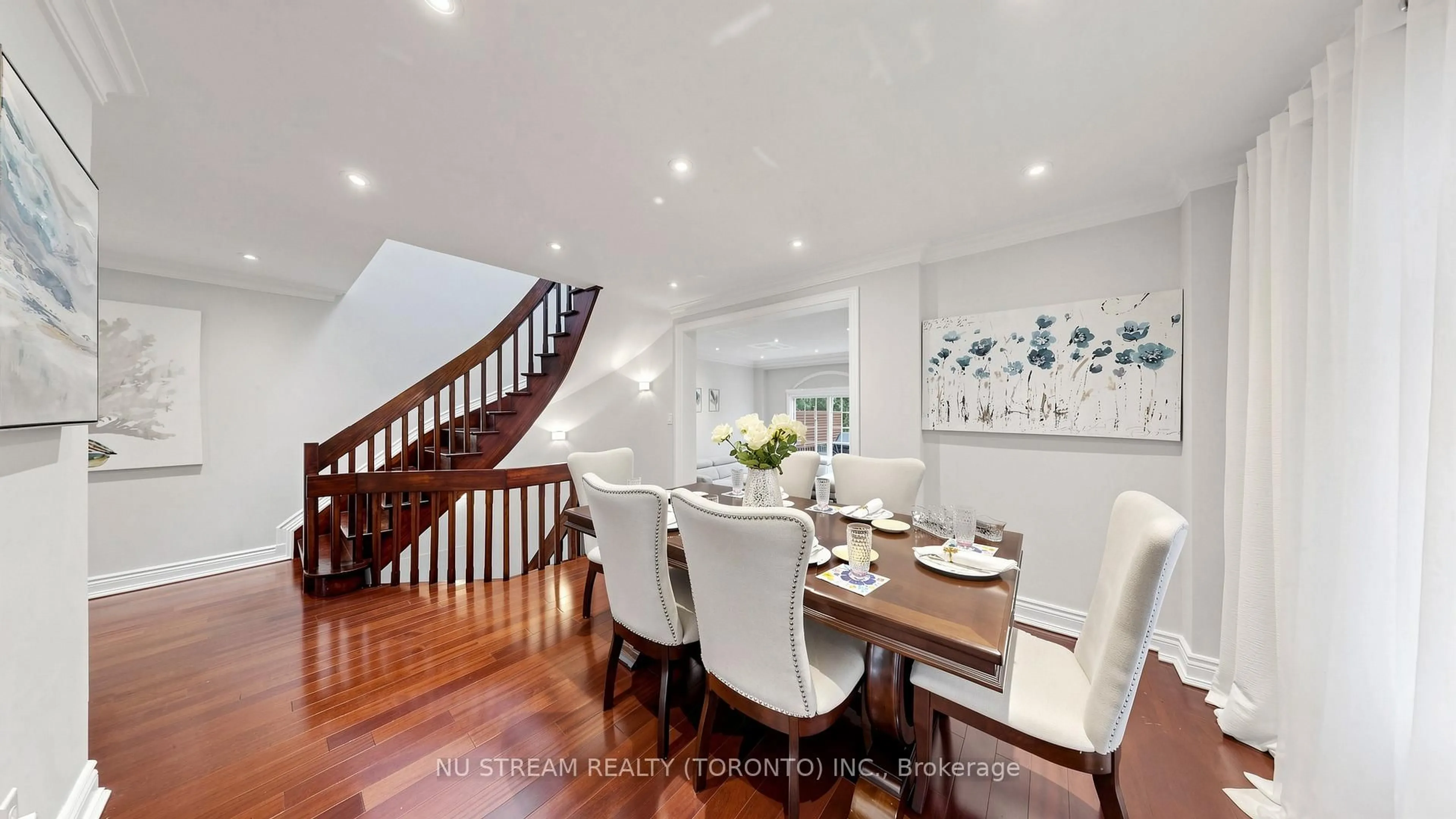 Dining room, wood/laminate floor for 31 Bowood Ave, Toronto Ontario M4N 1Y3