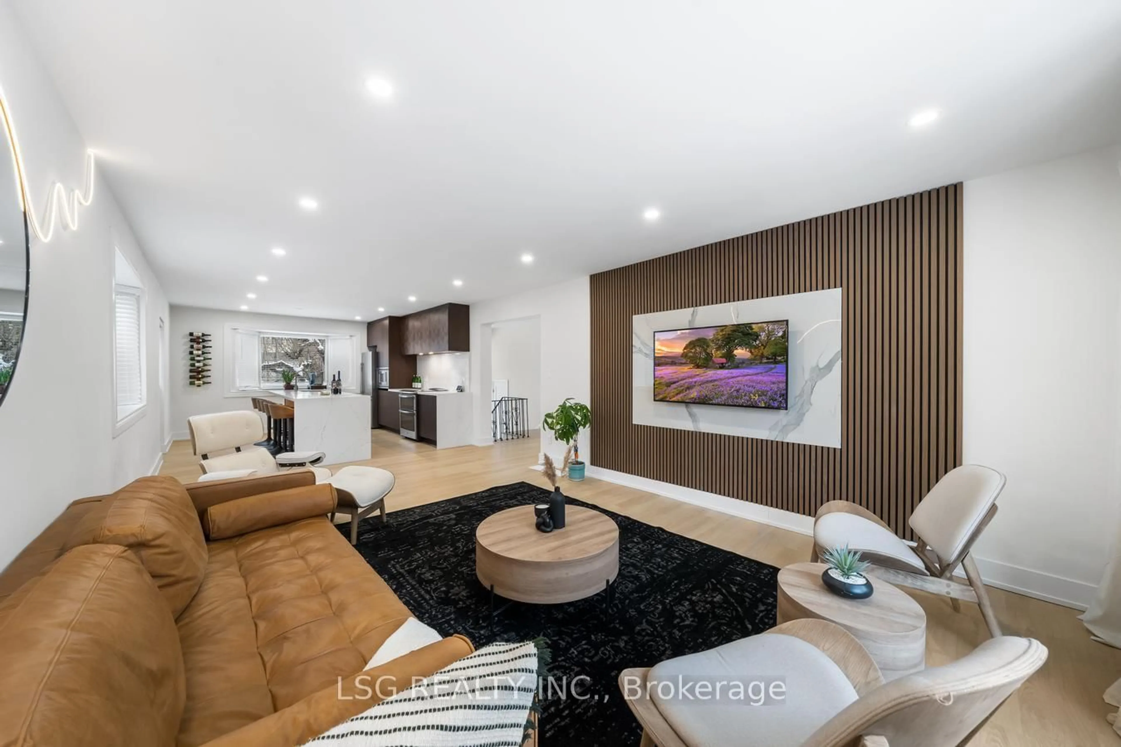 Living room with furniture, wood/laminate floor for 26 Grangemill Cres, Toronto Ontario M3B 2J2