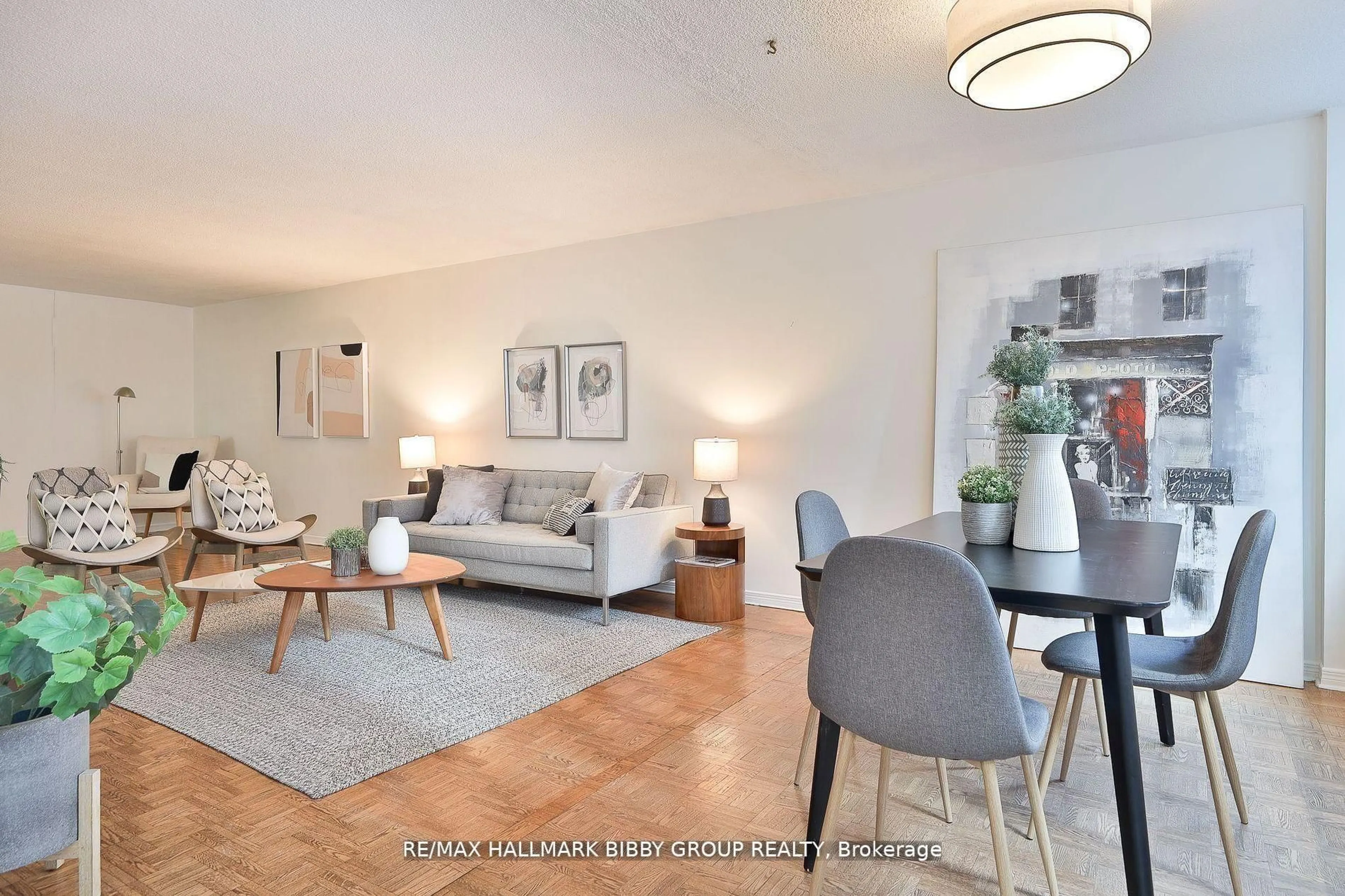 Living room with furniture, wood/laminate floor for 360 Bloor St #1007, Toronto Ontario M4W 3M3