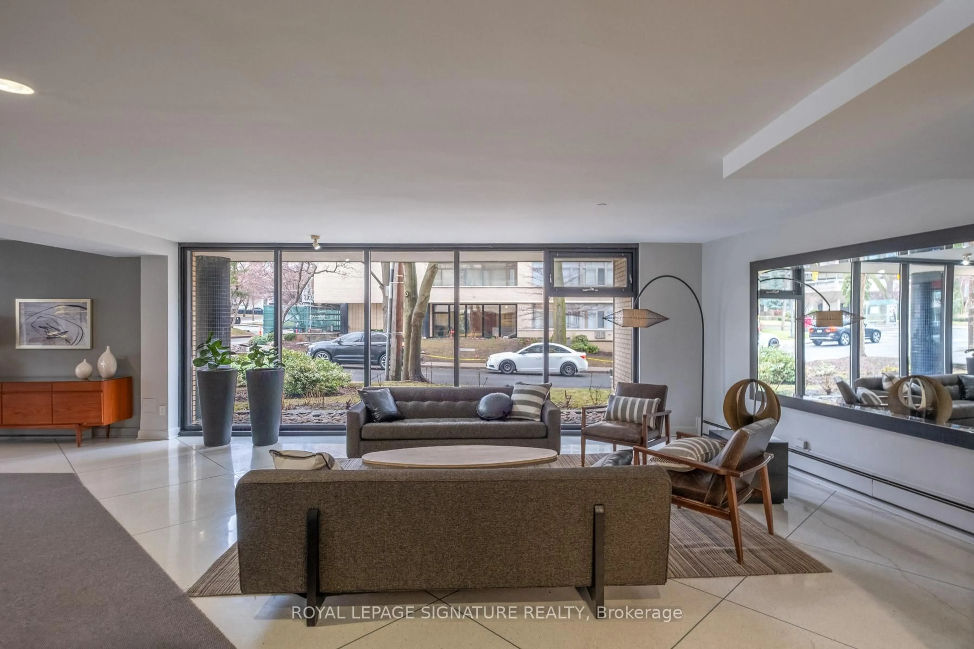 Living room with furniture, cement floor for 575 Avenue Rd #1105, Toronto Ontario M4V 2K2
