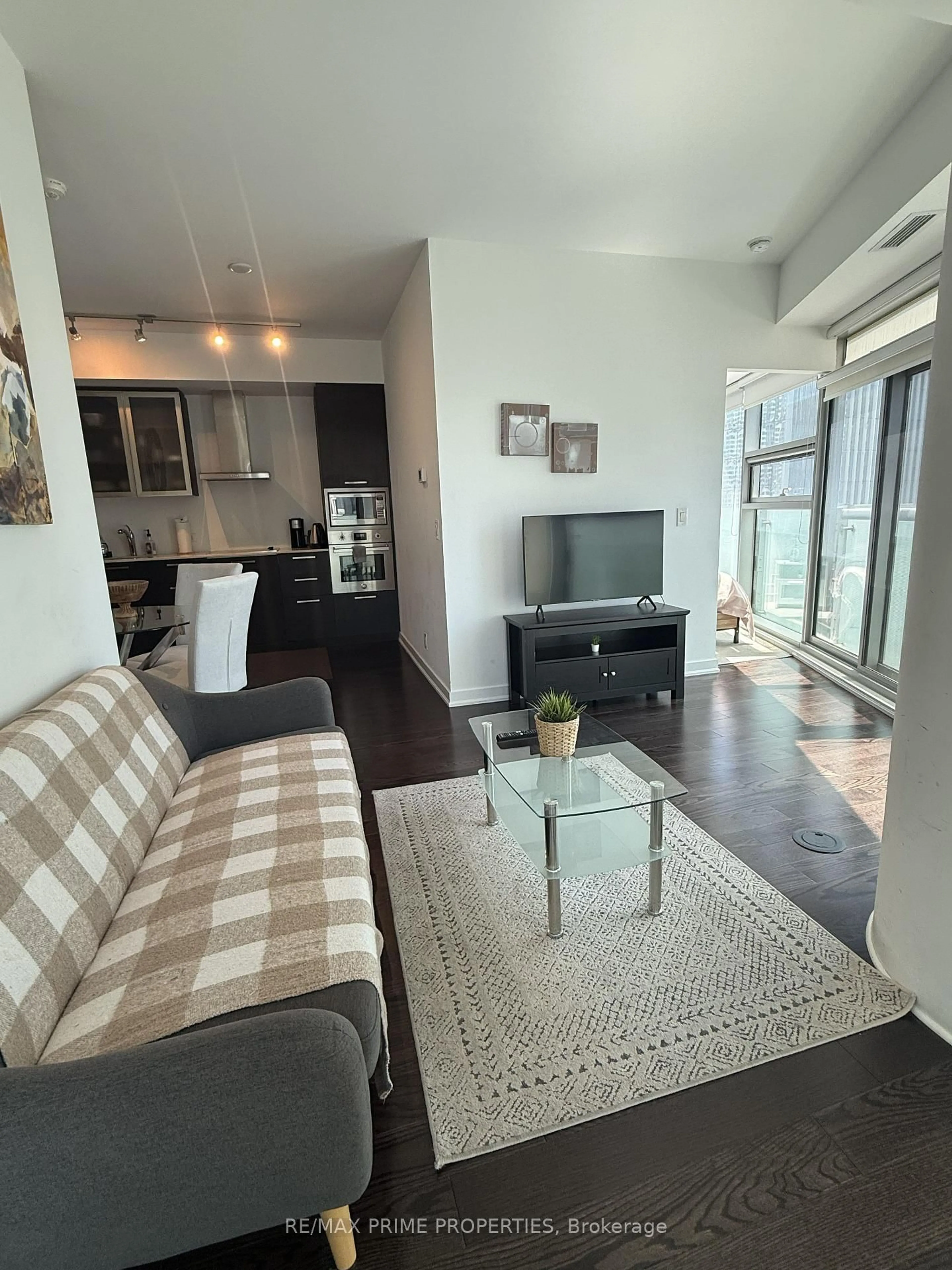 Living room with furniture, unknown for 14 York St #1605, Toronto Ontario M5J 0B1