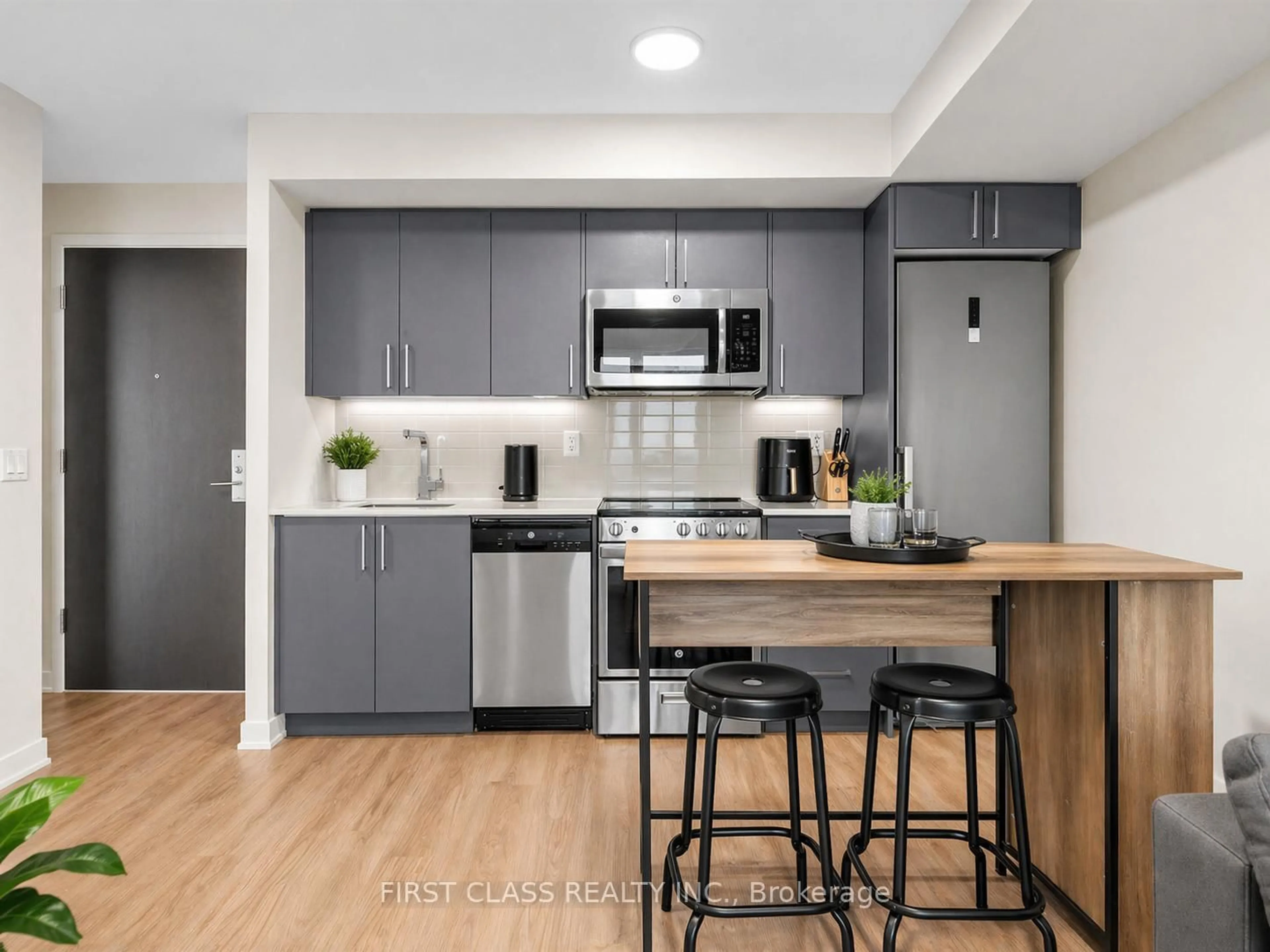 Open concept kitchen, unknown for 38 Monte Kwinter Crt #616, Toronto Ontario M3H 0E2