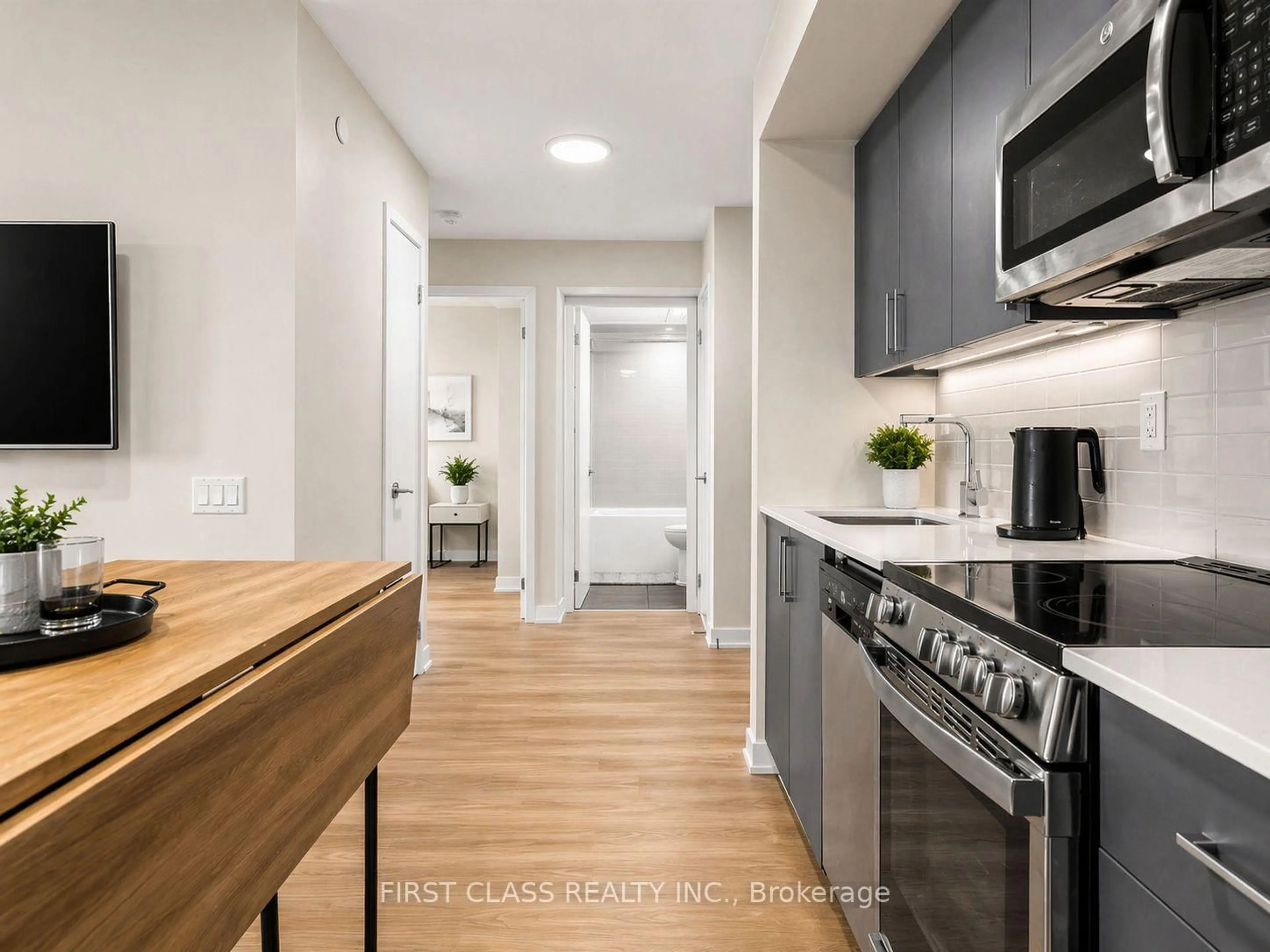 Open concept kitchen, unknown for 38 Monte Kwinter Crt #616, Toronto Ontario M3H 0E2