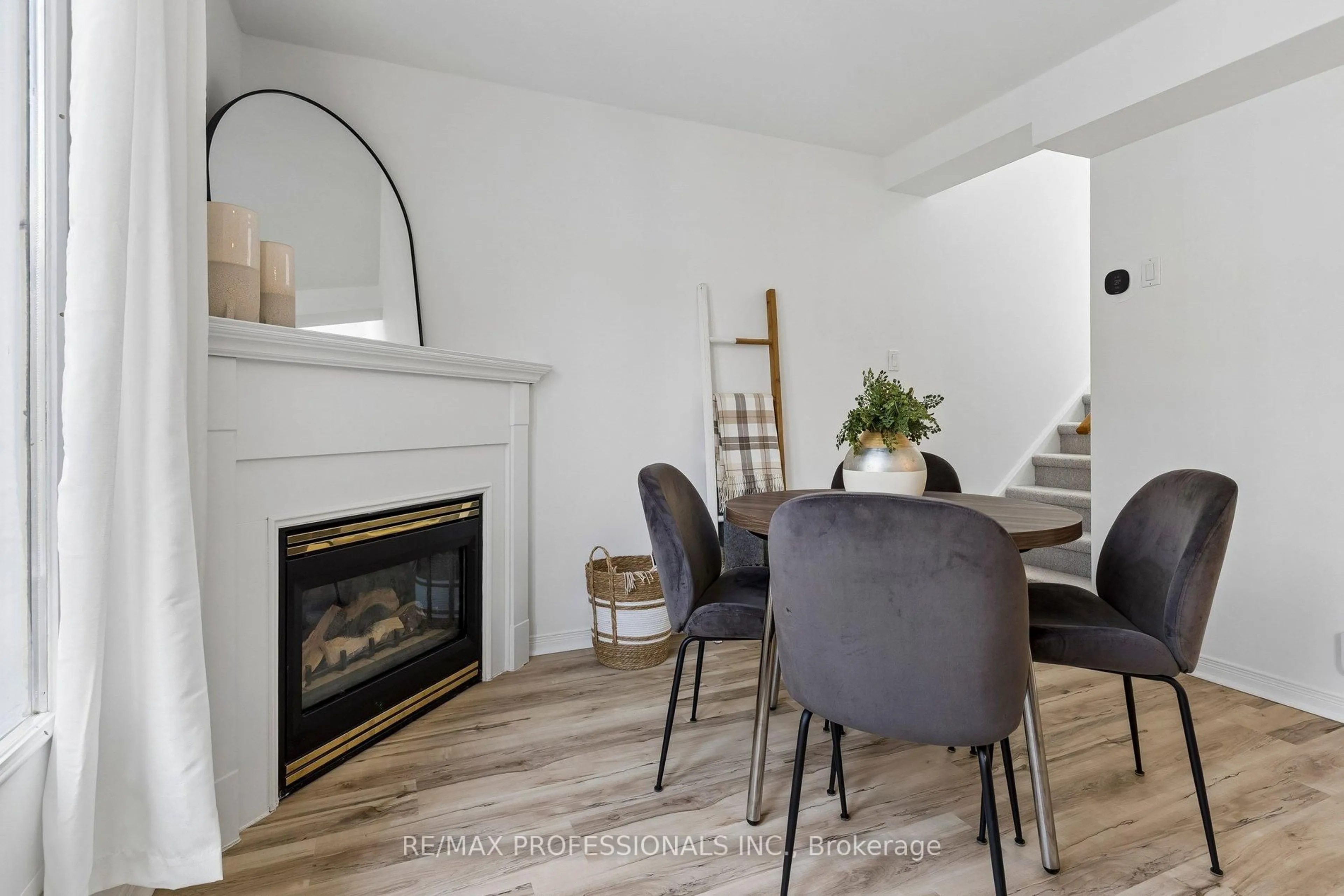 Living room with furniture, wood/laminate floor for 12 Sudbury St #2010, Toronto Ontario M6J 3W7