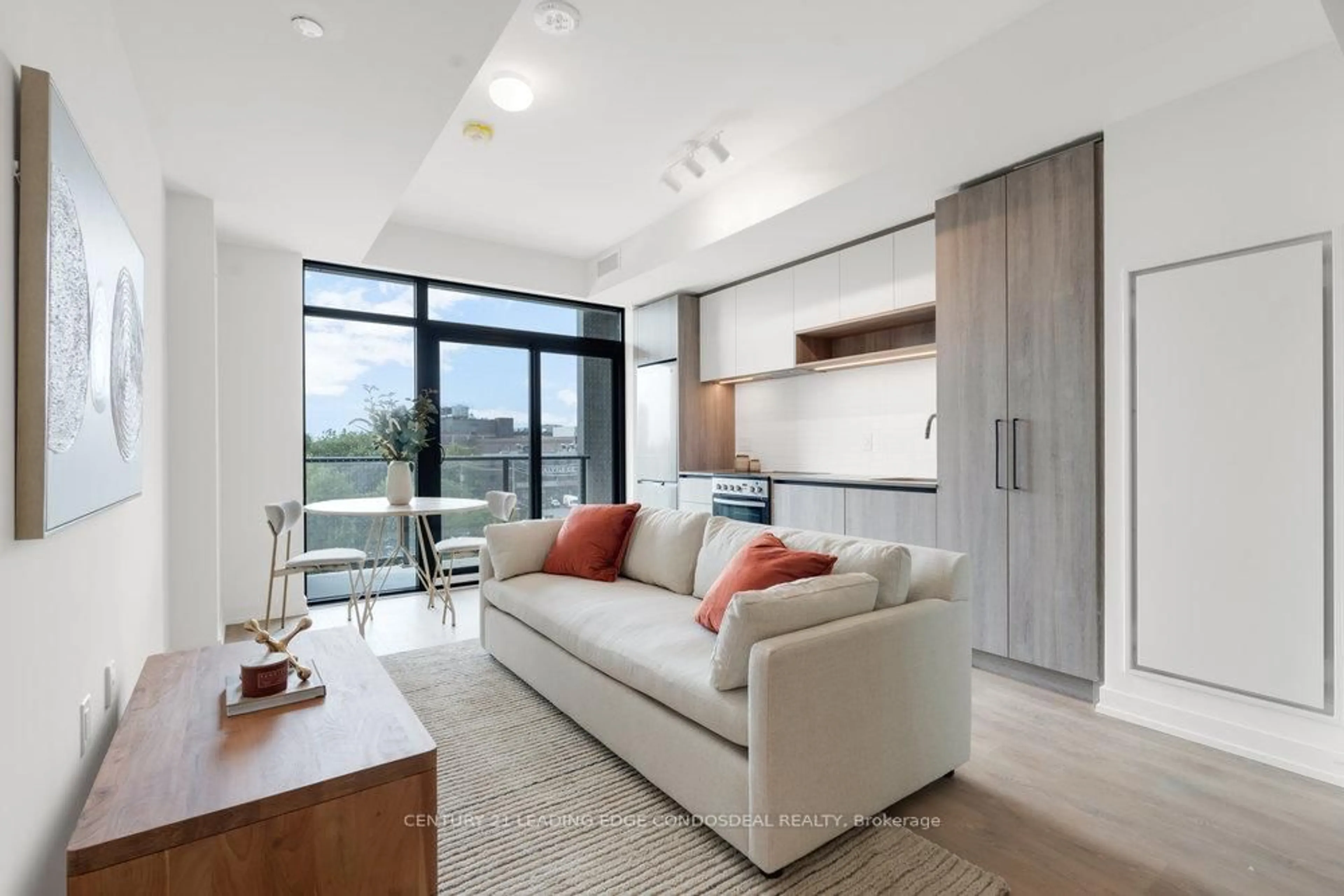 Living room with furniture, unknown for 181 Sterling Rd #404, Toronto Ontario M6R 2B2
