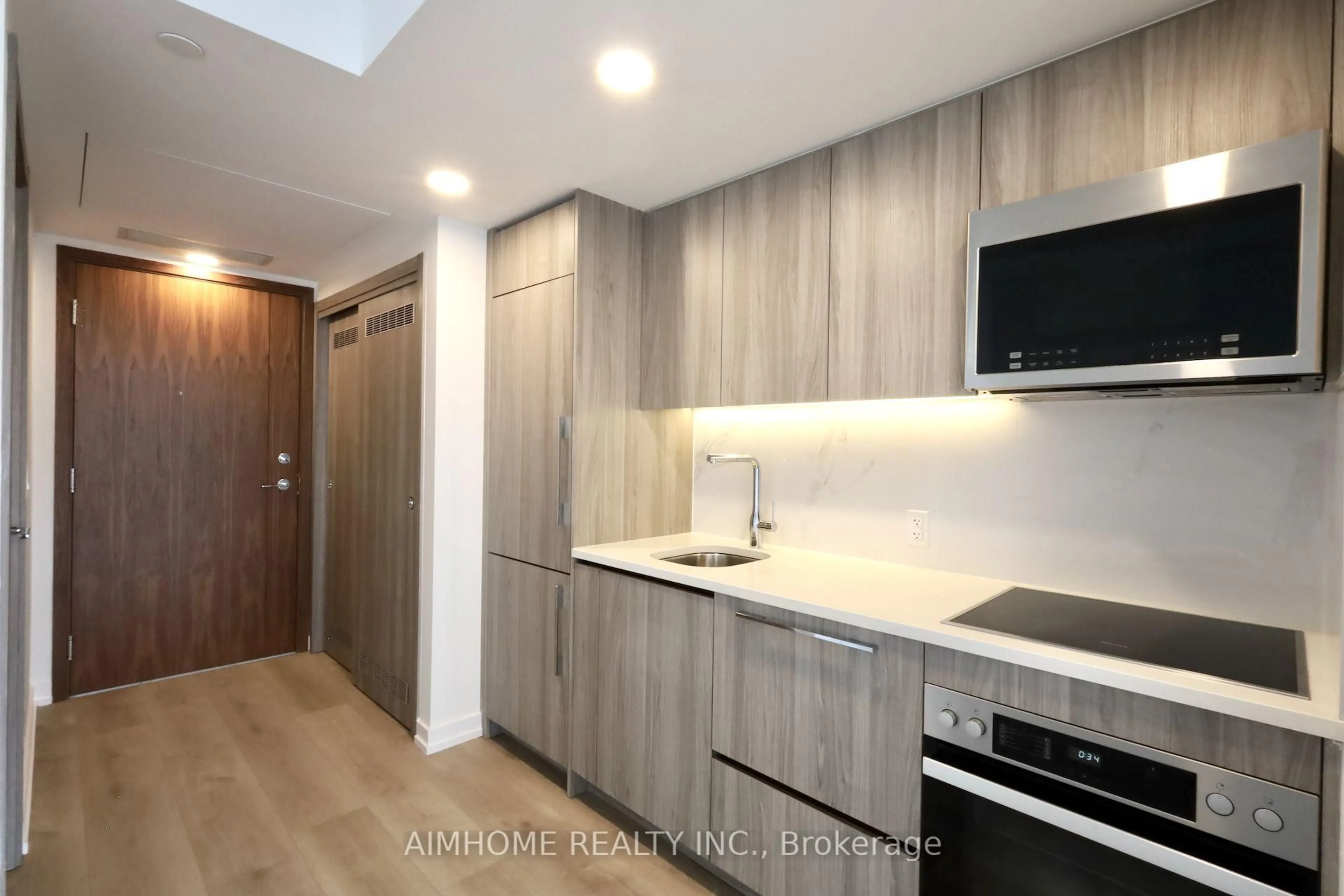 Standard kitchen, wood/laminate floor for 38 Widmer St #2205, Toronto Ontario M5V 0P7