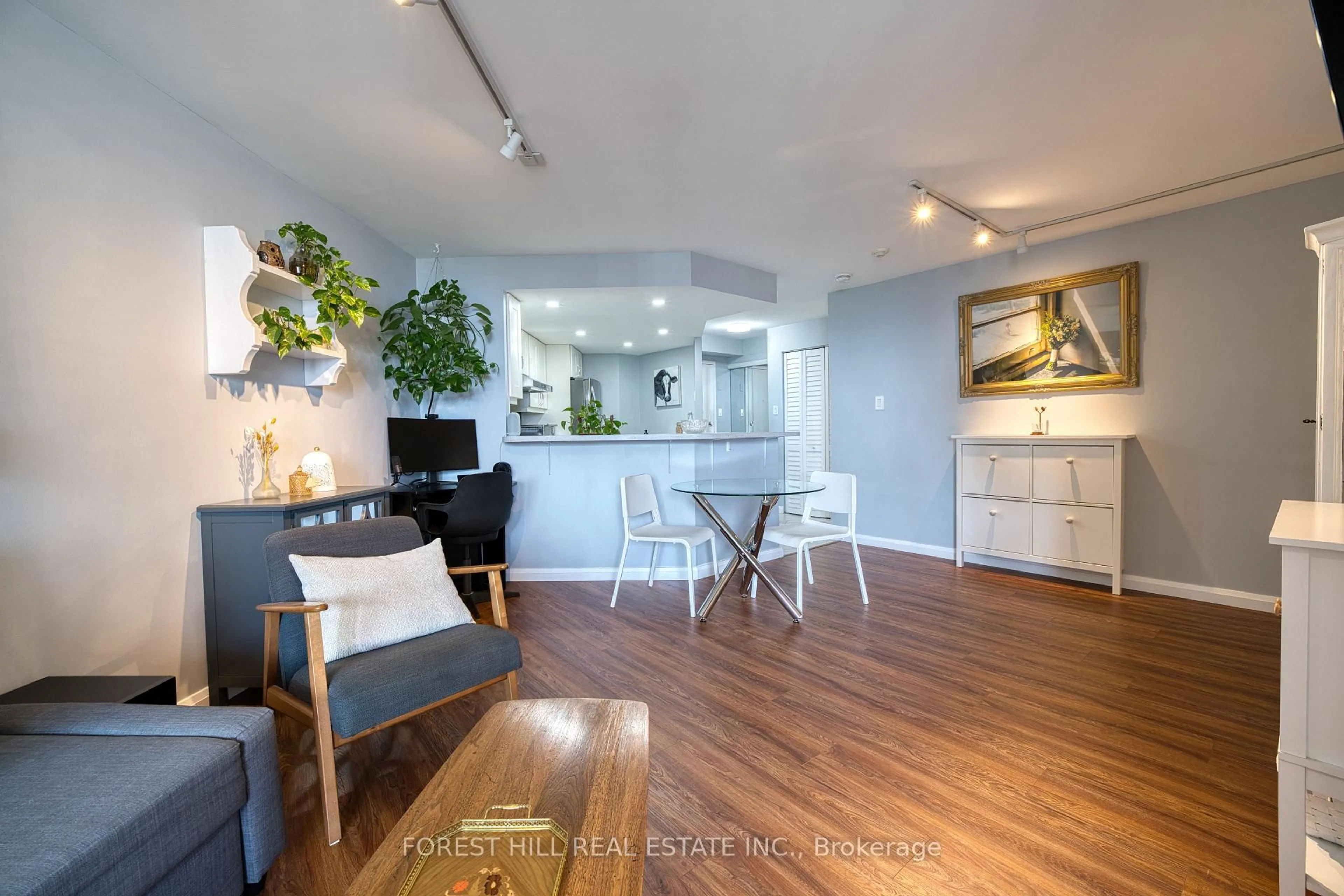 Open concept kitchen, wood/laminate floor for 77 Maitland Pl #1904, Toronto Ontario M4Y 2V6