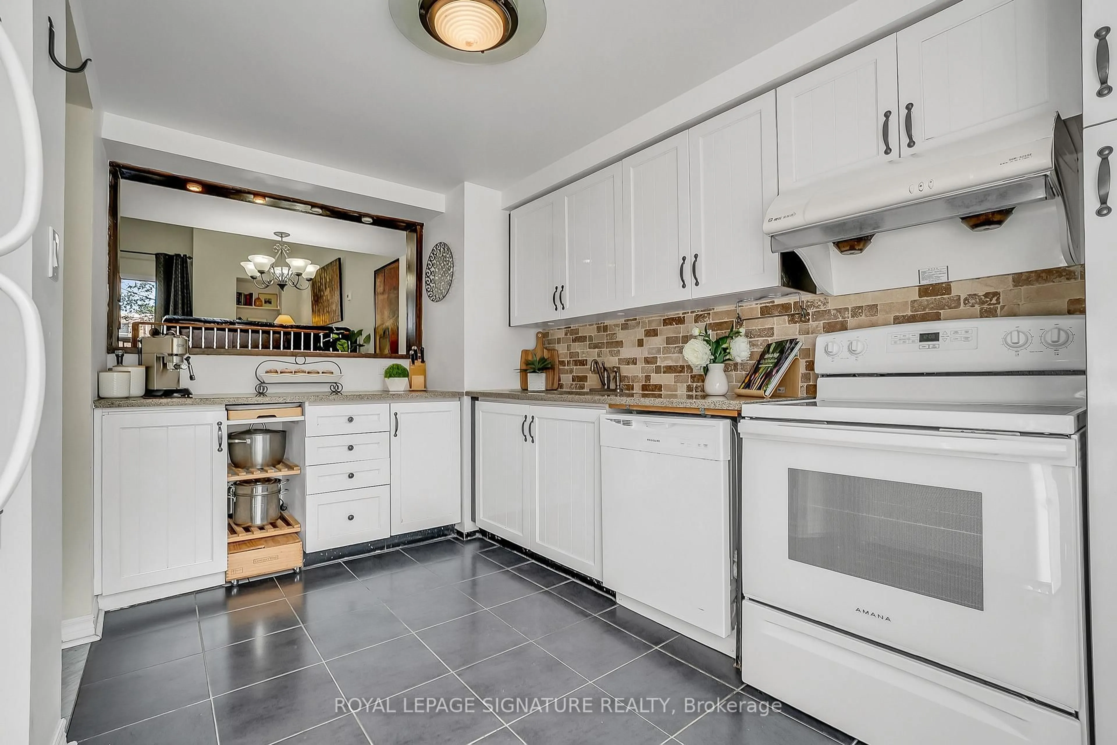 Open concept kitchen, ceramic/tile floor for 94 Dutch Myrtle Way, Toronto Ontario M3B 3K8
