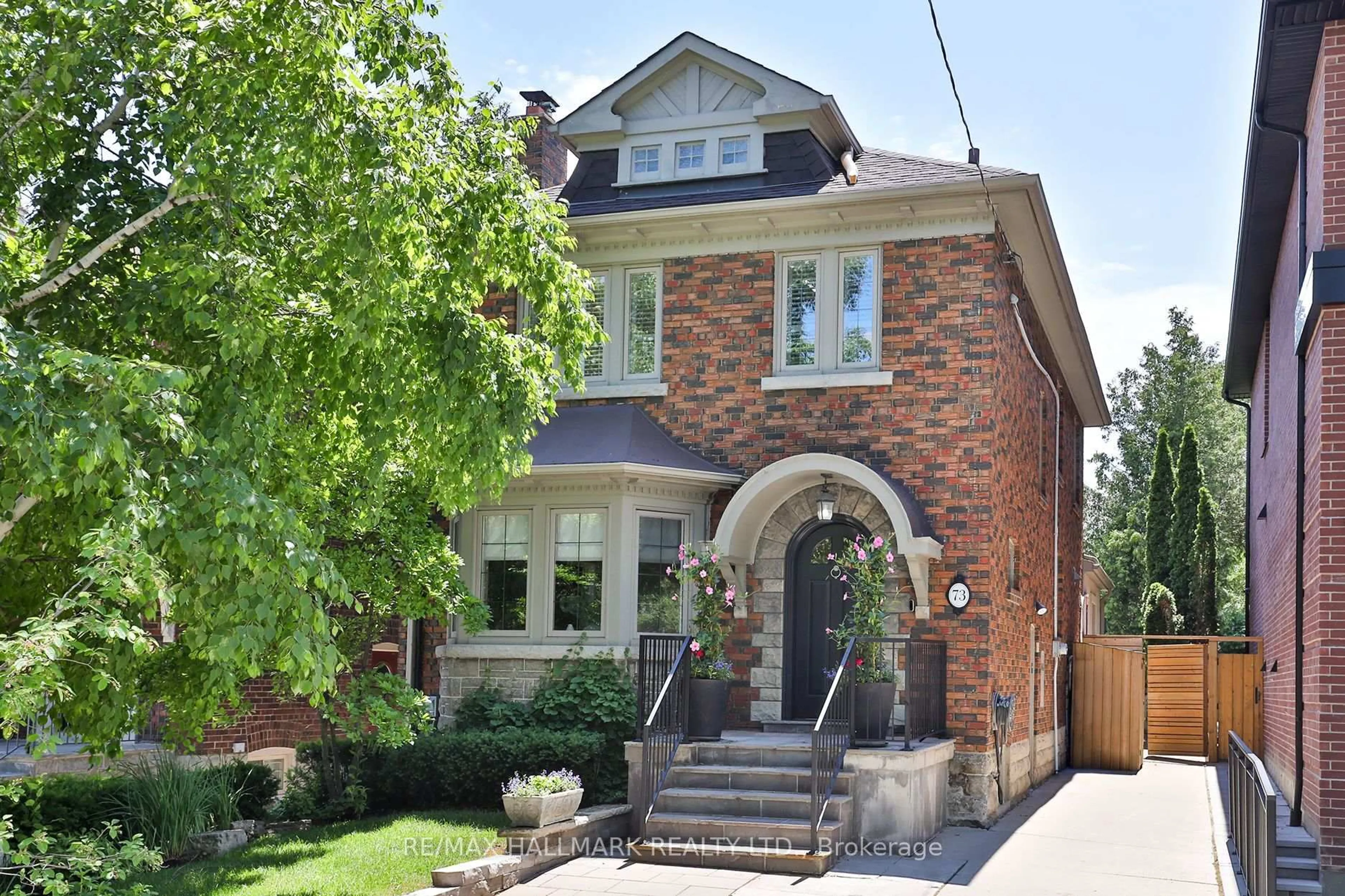 Home with brick exterior material, street for 73 Elwood Blvd, Toronto Ontario M5N 1G9
